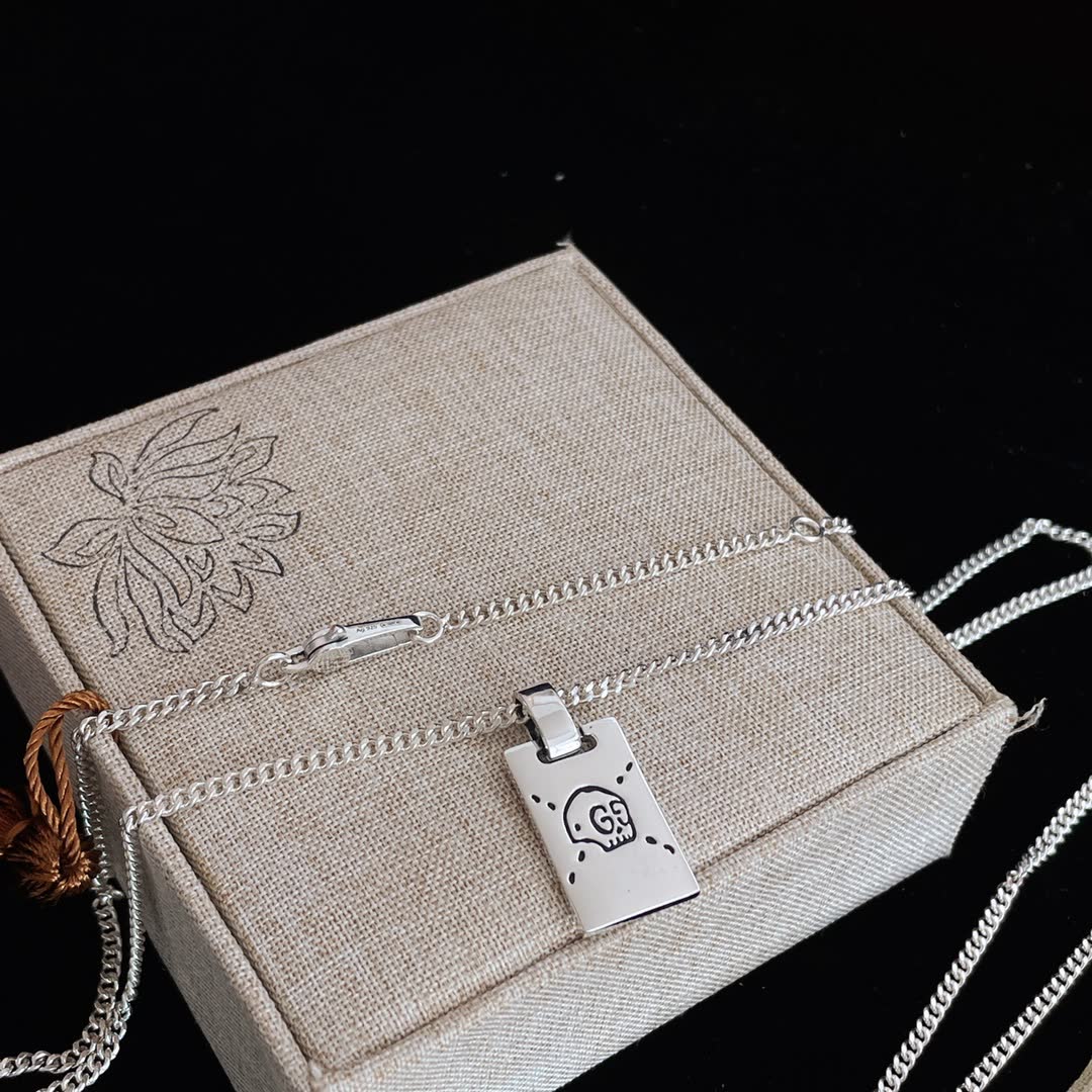Gucci Silver Skull Tag Necklace