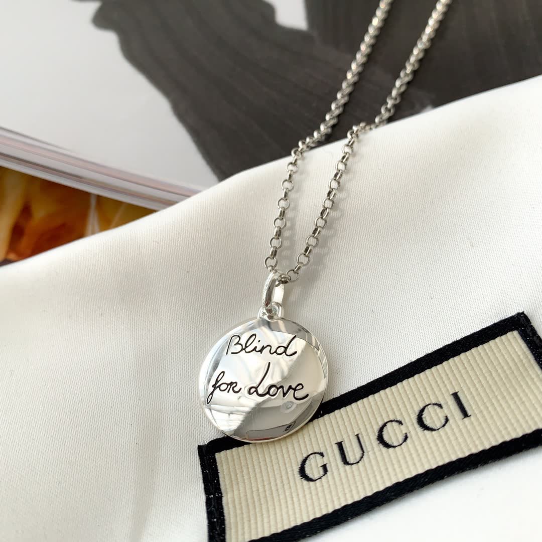 Gucci Silver Medallion Necklace