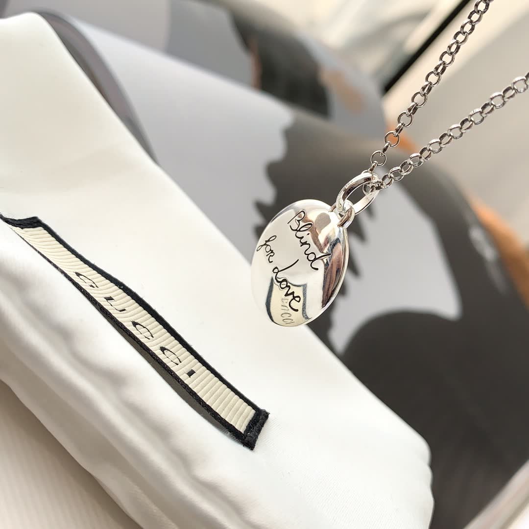 Gucci Silver Medallion Necklace