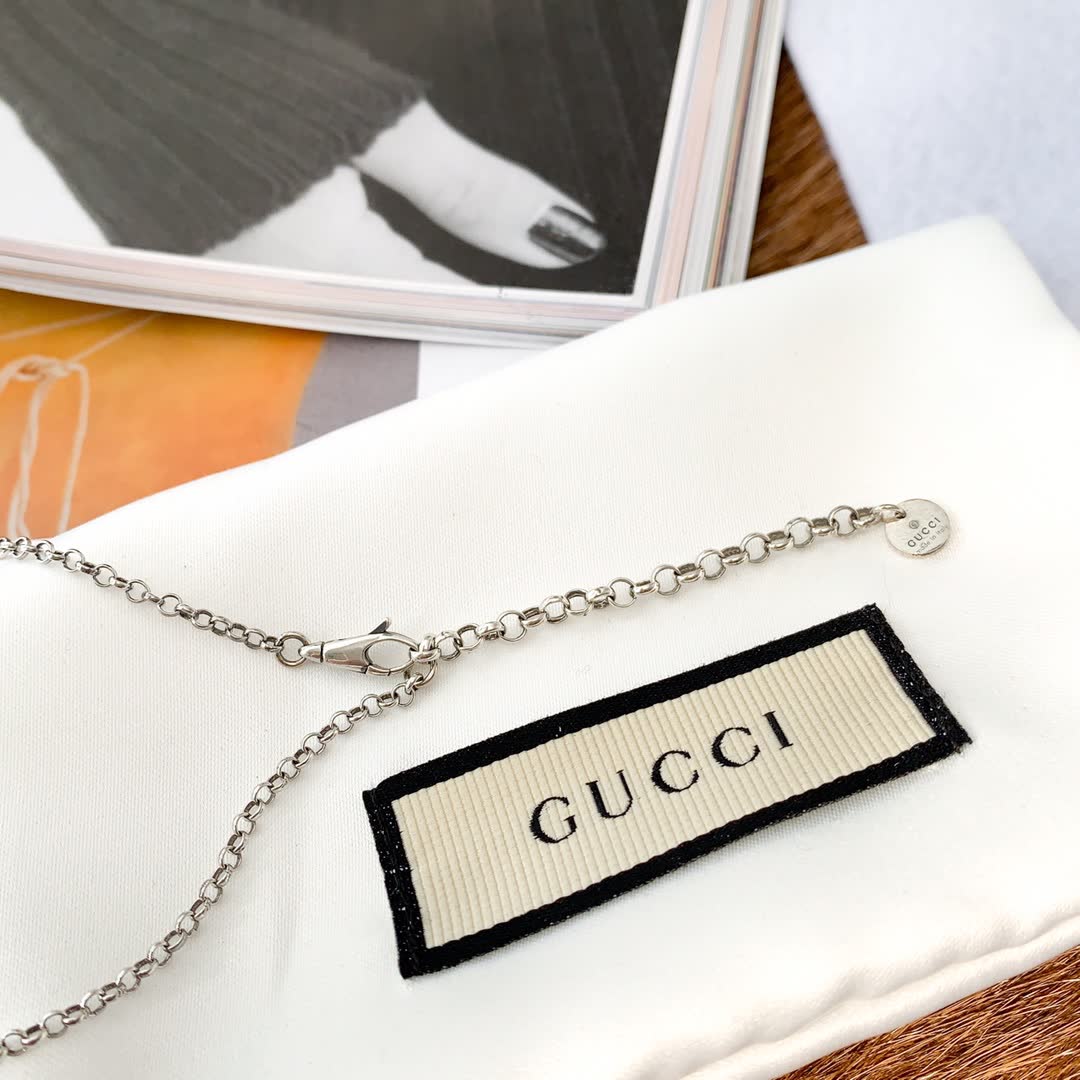 Gucci Silver Medallion Necklace