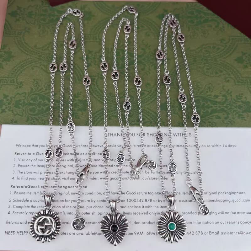 Gucci Silver Flower Pendant Necklace with Green Stone