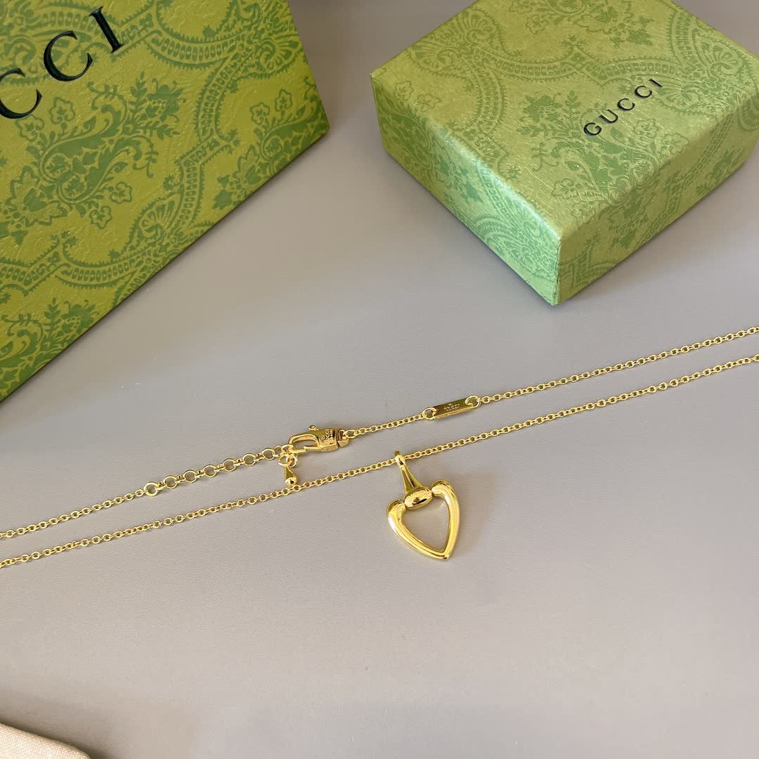 Gucci Gold Heart Pendant Necklace