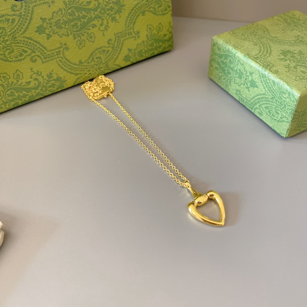 Gucci Gold Heart Pendant Necklace