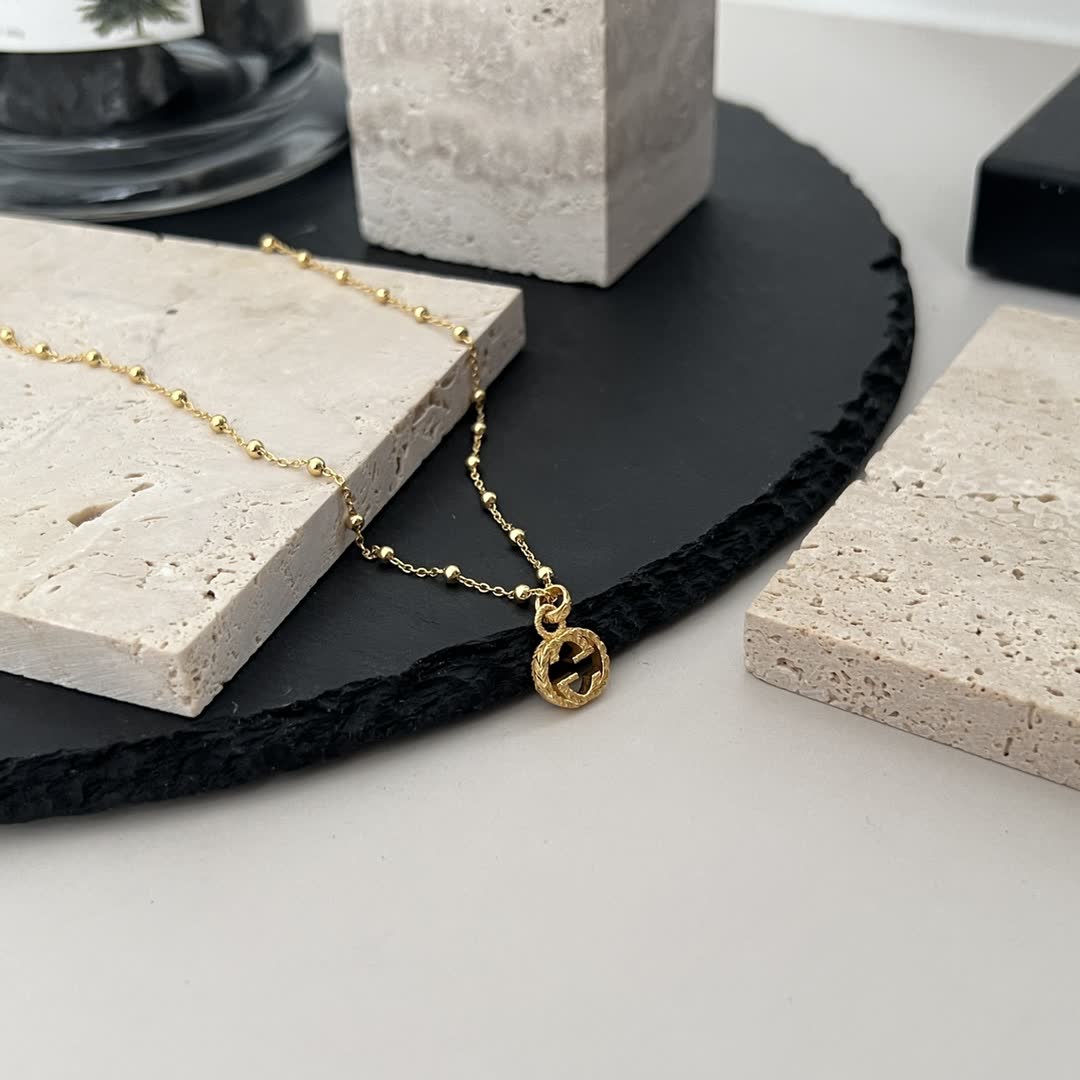 Gucci Gold Beaded Chain with Cross Pendant Gucci Gold Beaded Chain with Cross Pendant