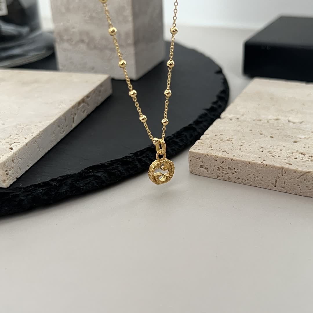 Gucci Gold Beaded Chain with Cross Pendant