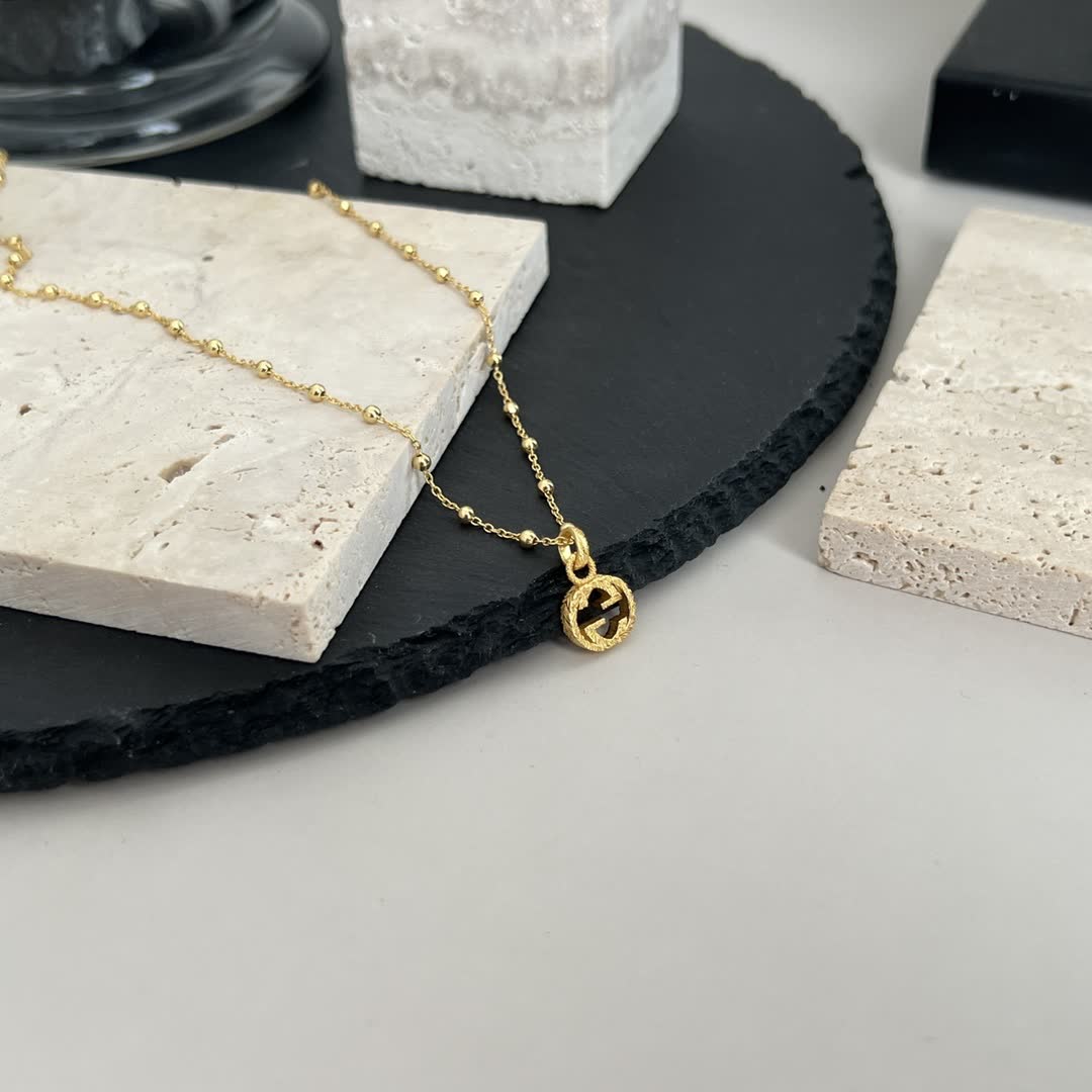 Gucci Gold Beaded Chain with Cross Pendant