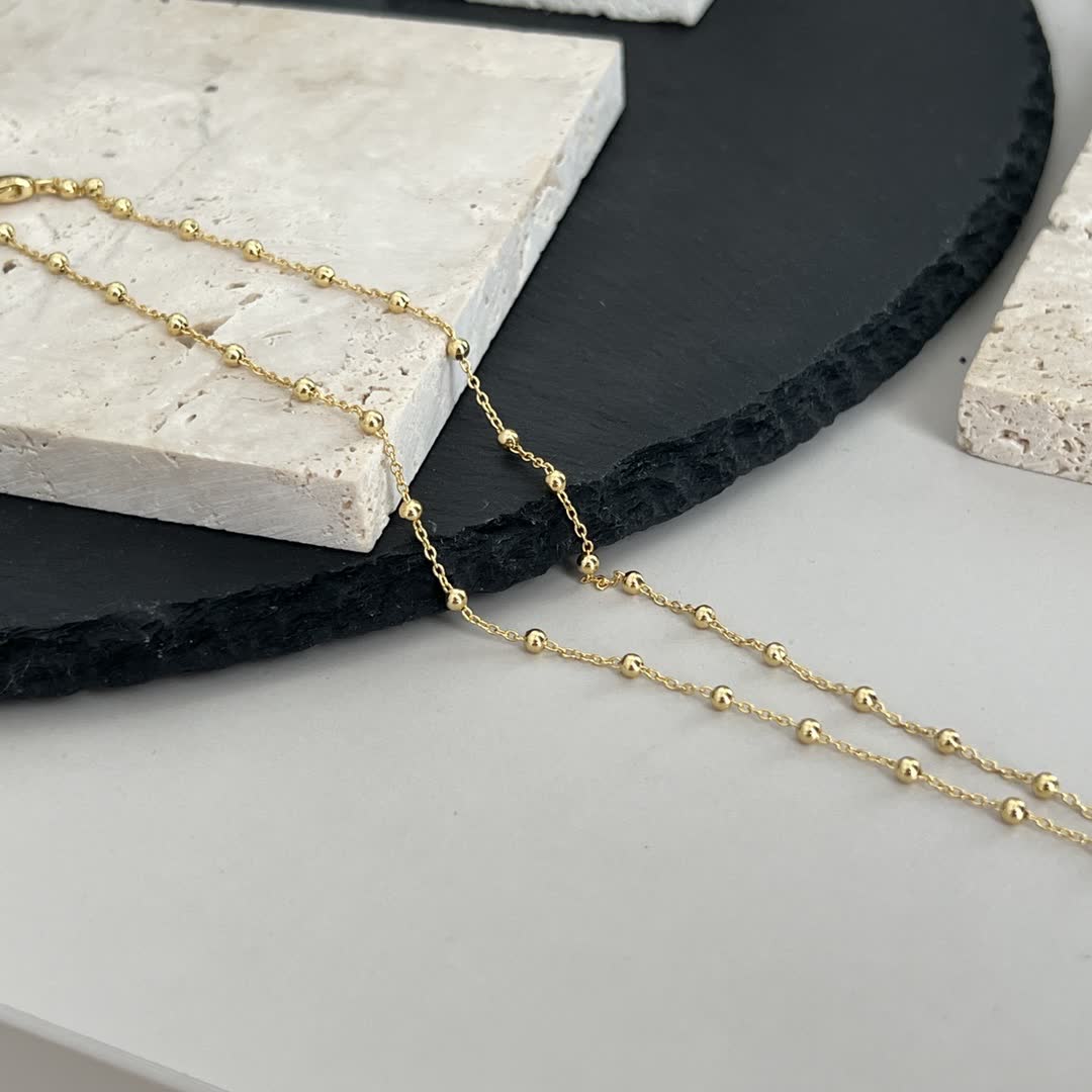 Gucci Gold Beaded Chain with Cross Pendant