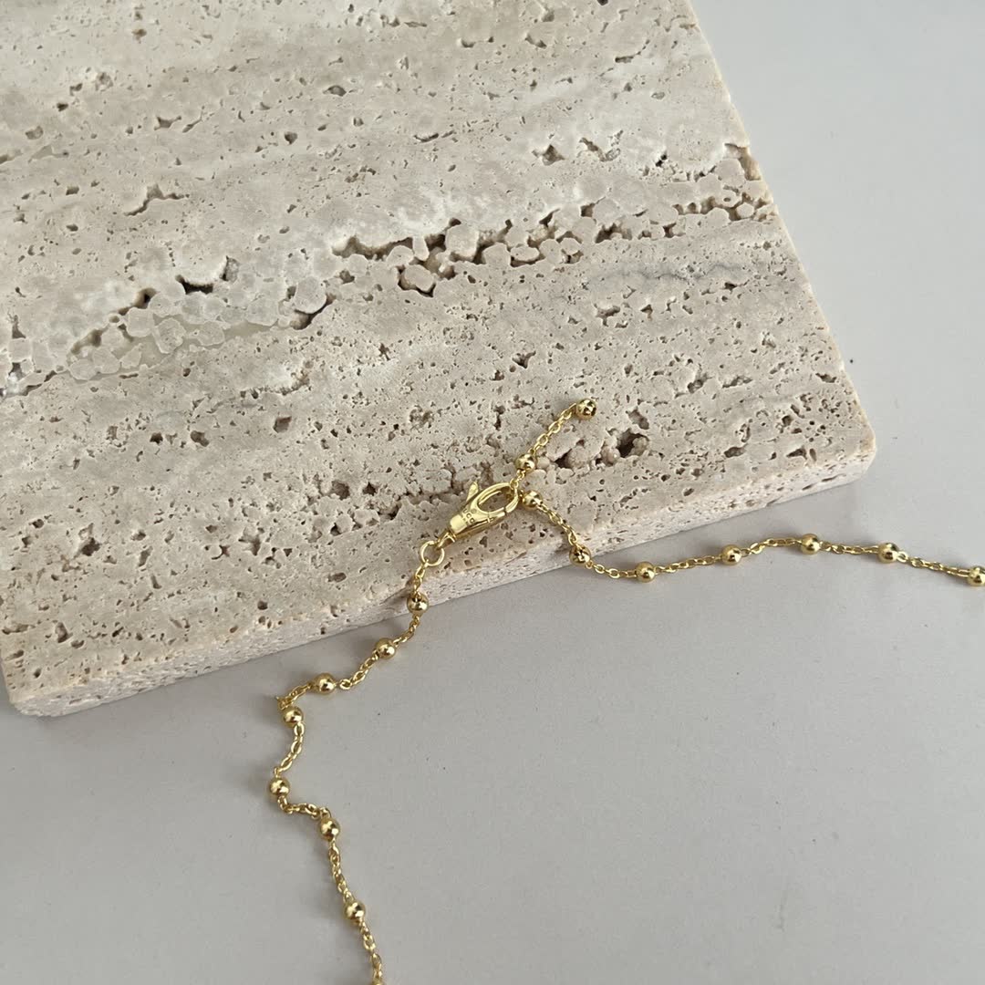 Gucci Gold Beaded Chain with Cross Pendant
