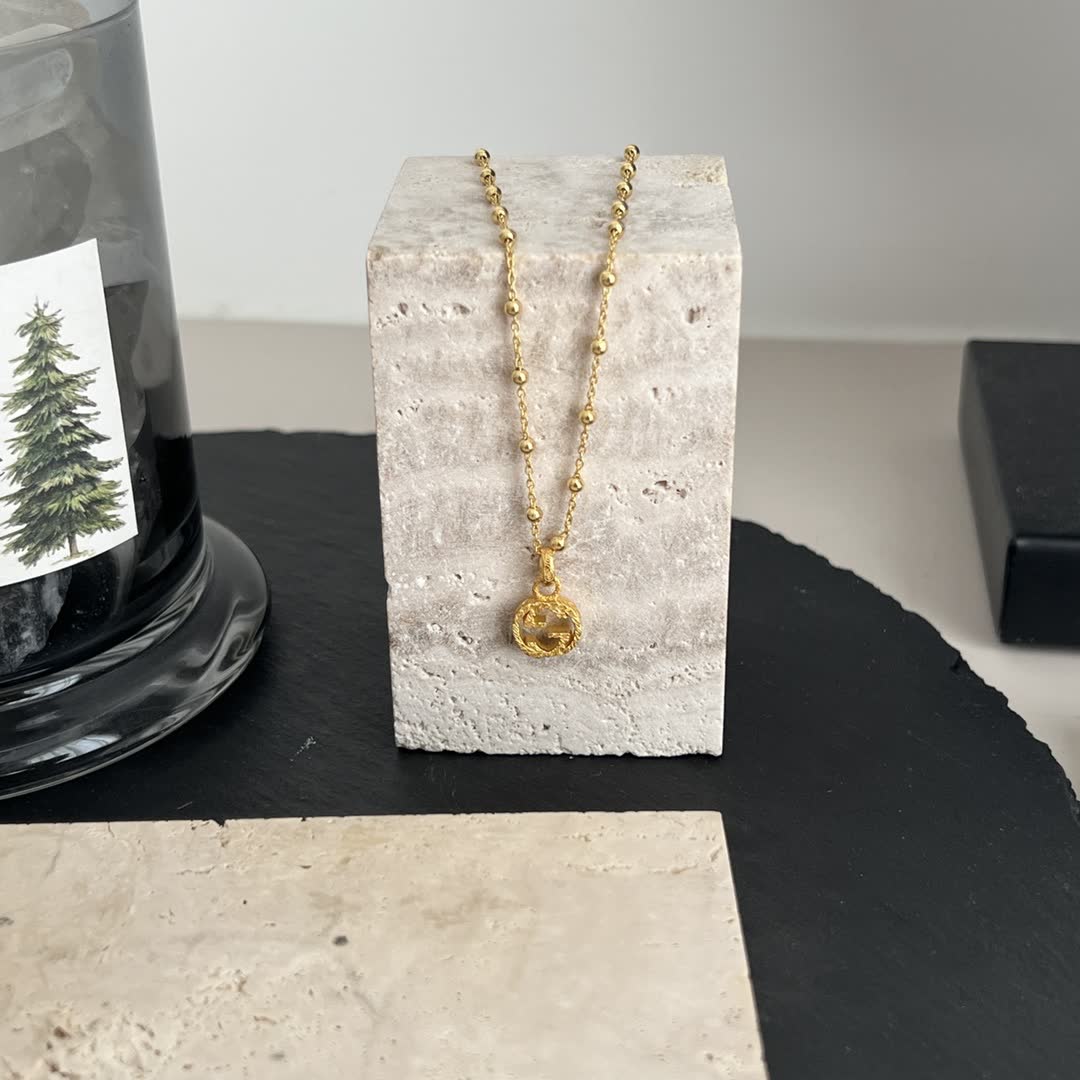 Gucci Gold Beaded Chain with Cross Pendant