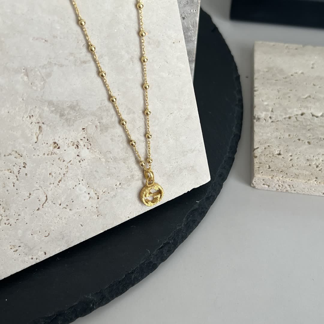Gucci Gold Beaded Chain with Cross Pendant