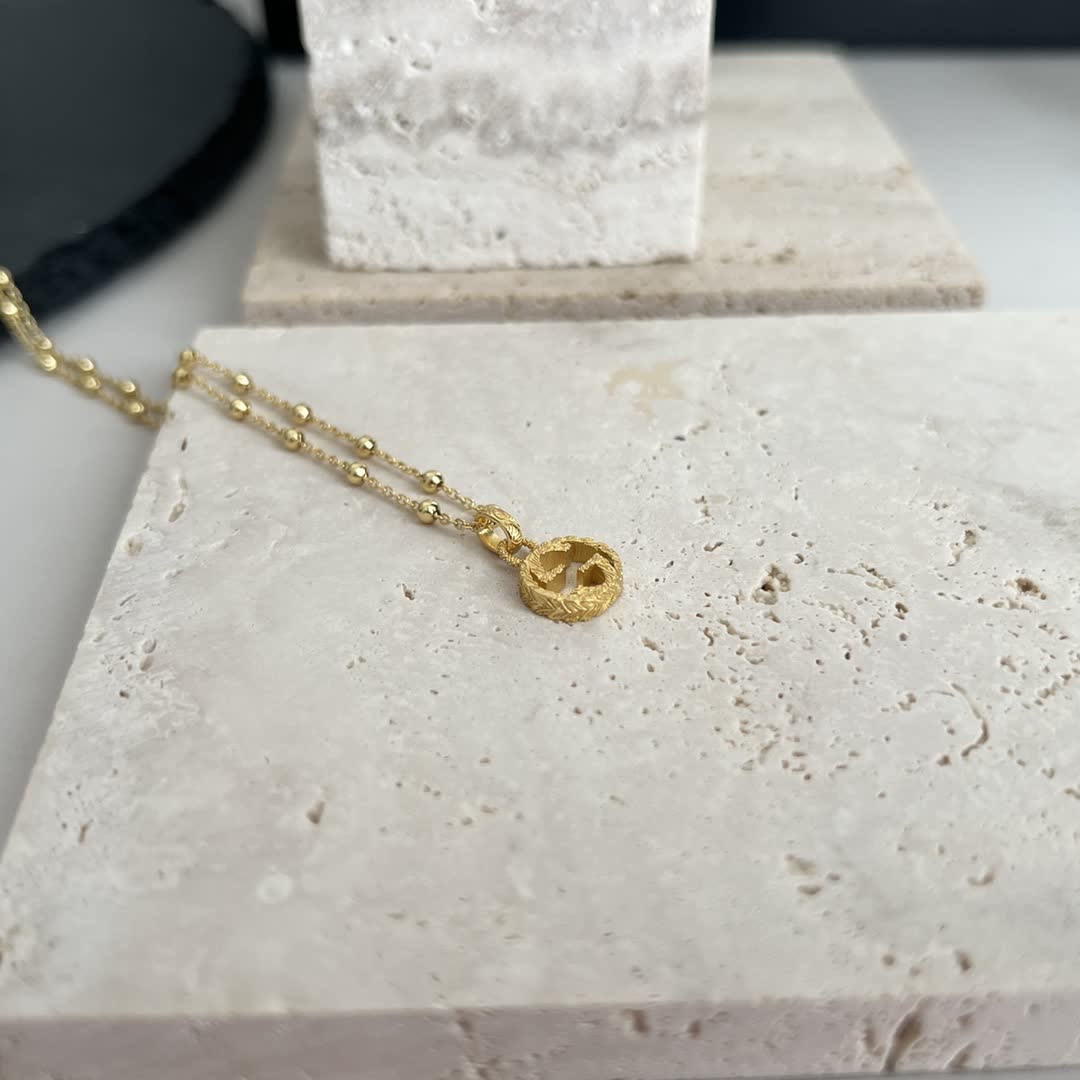 Gucci Gold Beaded Chain with Cross Pendant