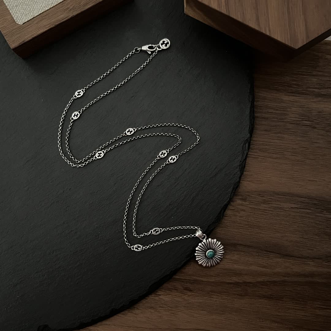 Gucci Silver Flower Pendant with Turquoise Stone