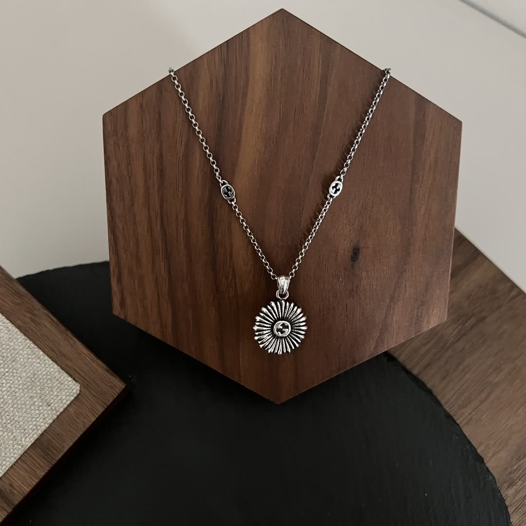 Gucci Silver Flower Pendant with Turquoise Stone