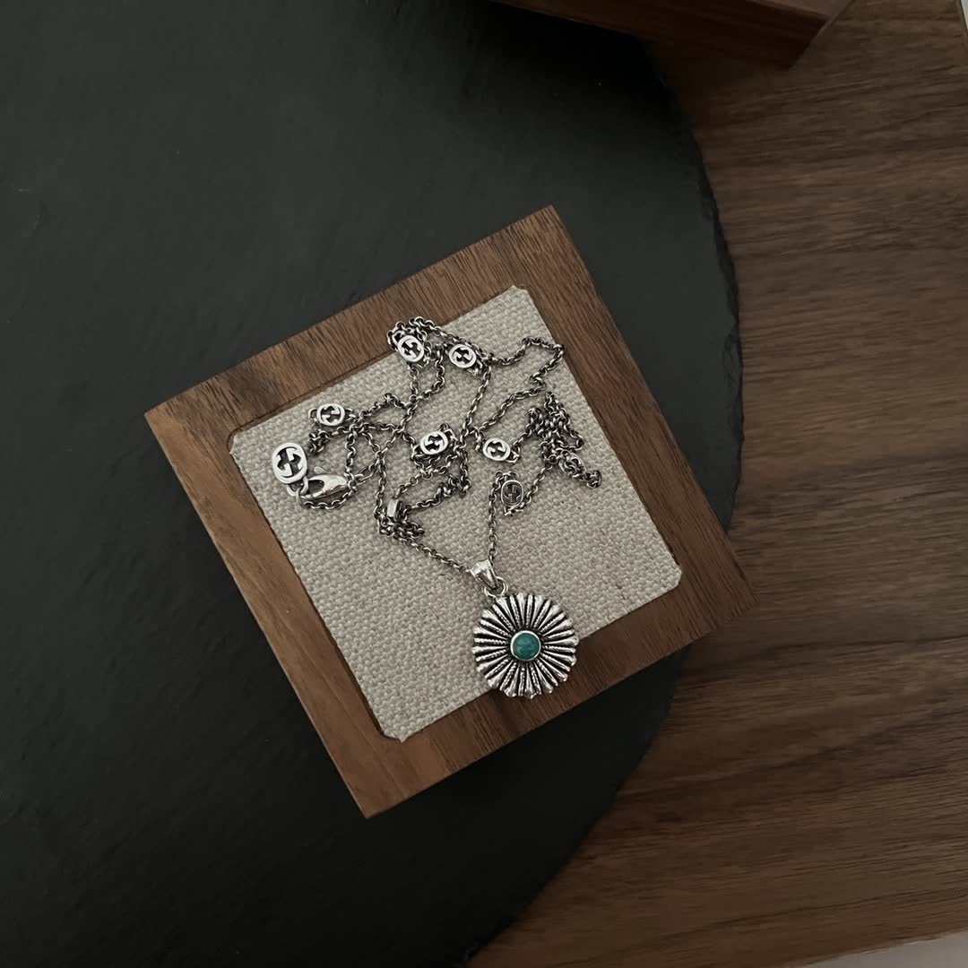 Gucci Silver Flower Pendant with Turquoise Stone