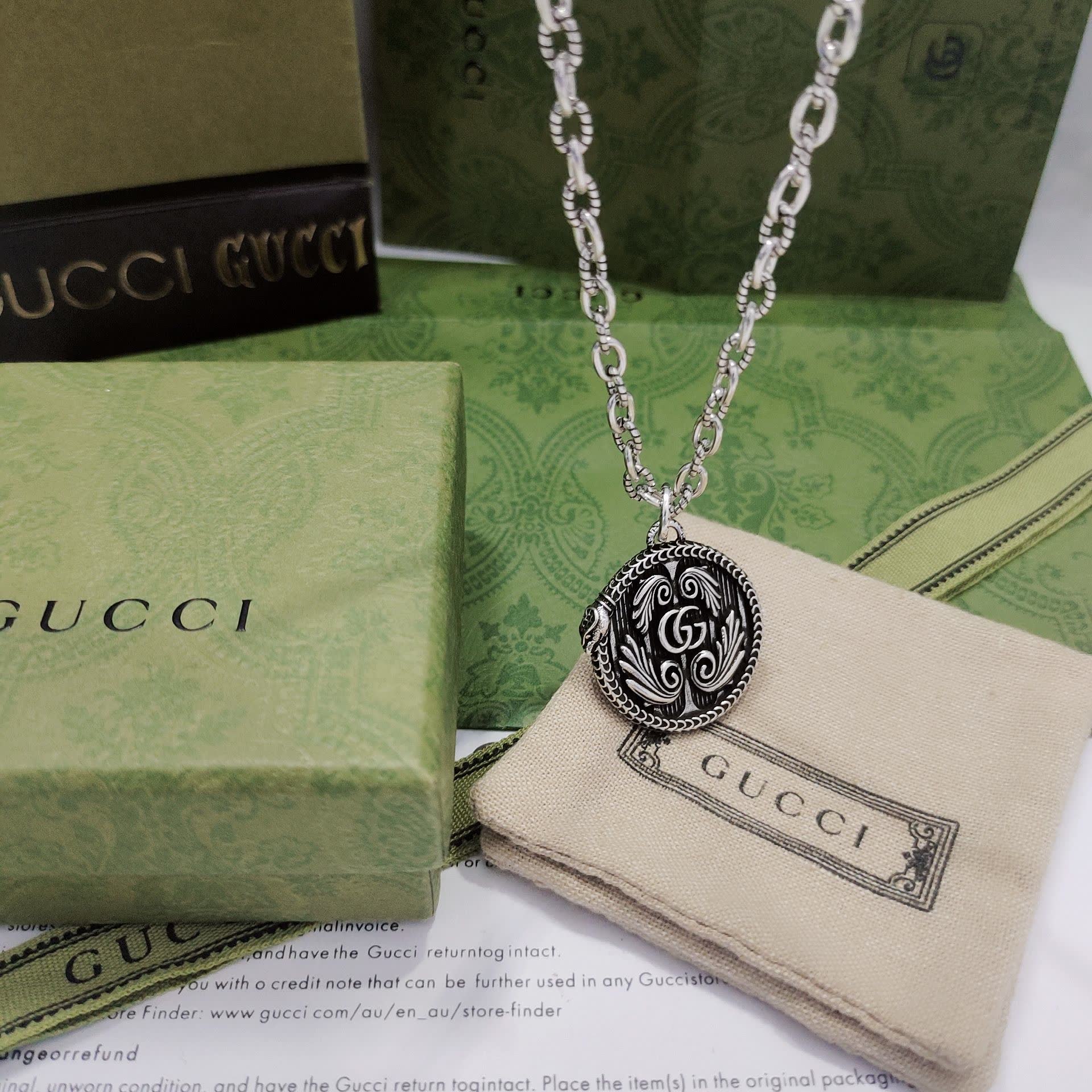 Gucci Silver 'G' Medallion Necklace