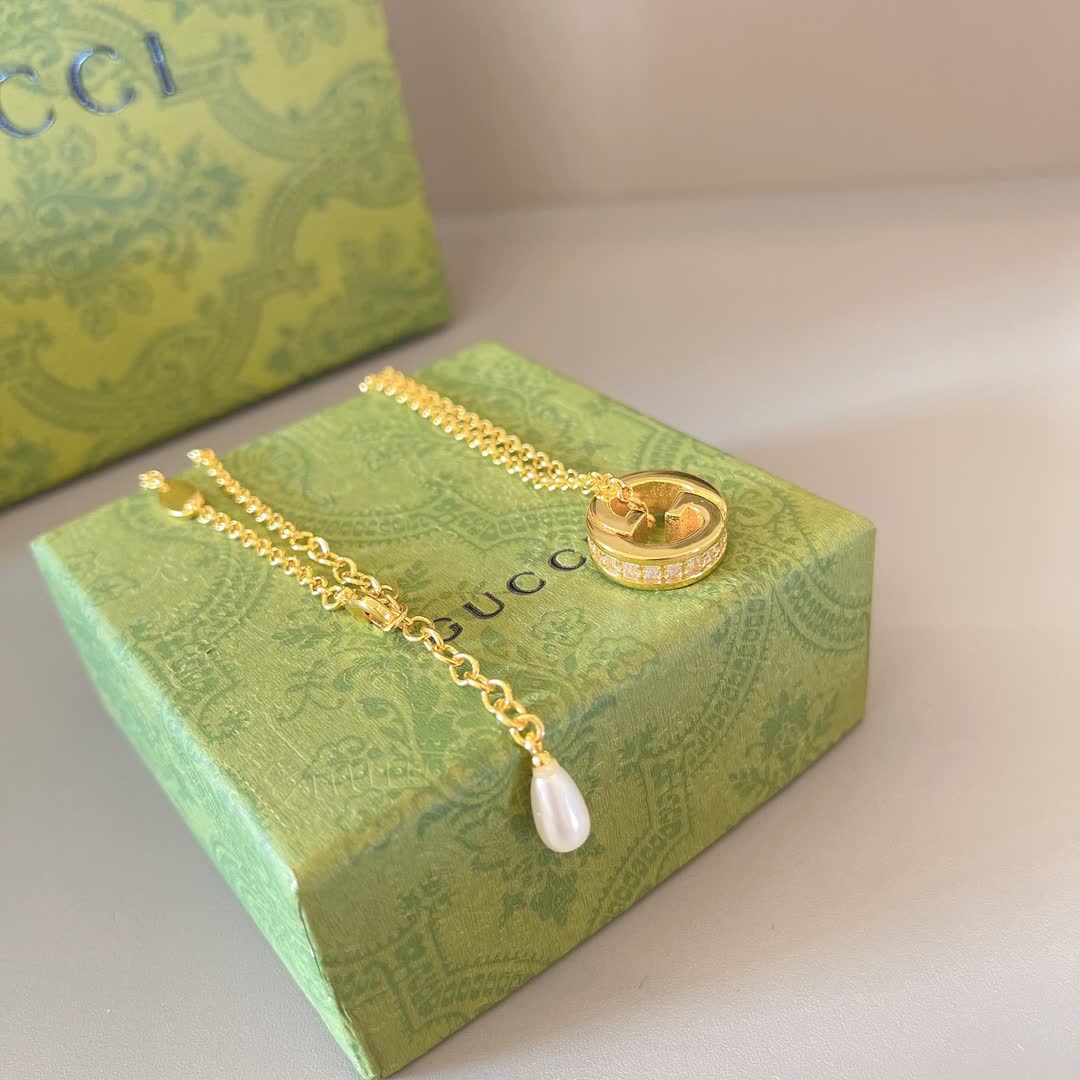 Gucci Gold Tone G Logo and Pearl Pendant Necklace