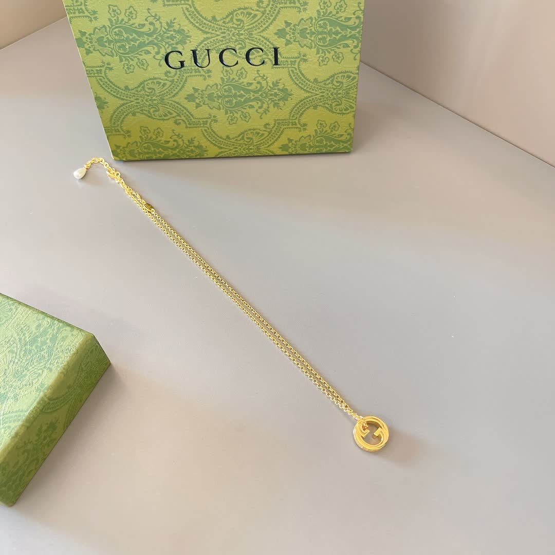 Gucci Gold Tone G Logo and Pearl Pendant Necklace