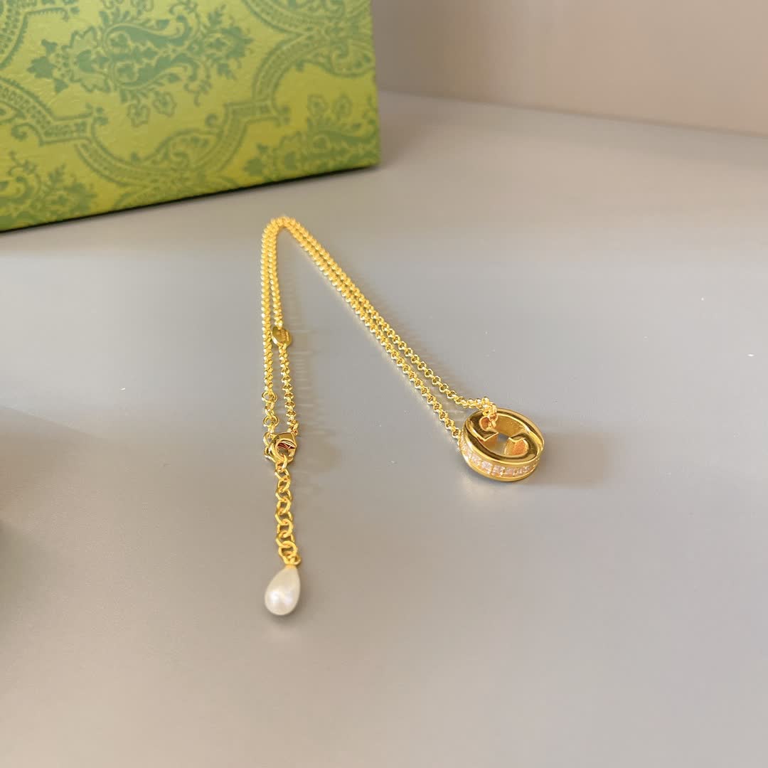 Gucci Gold Tone G Logo and Pearl Pendant Necklace