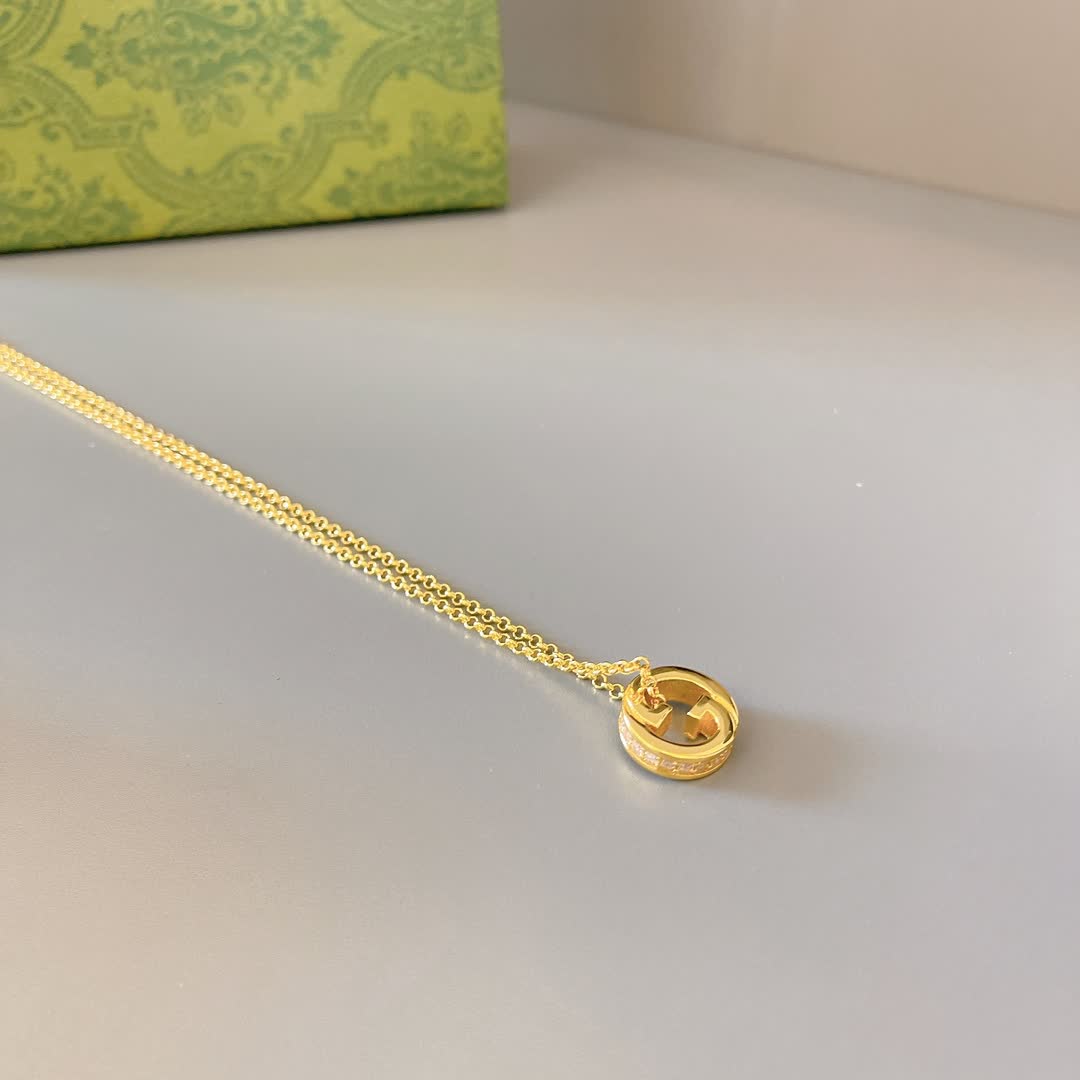 Gucci Gold Tone G Logo and Pearl Pendant Necklace