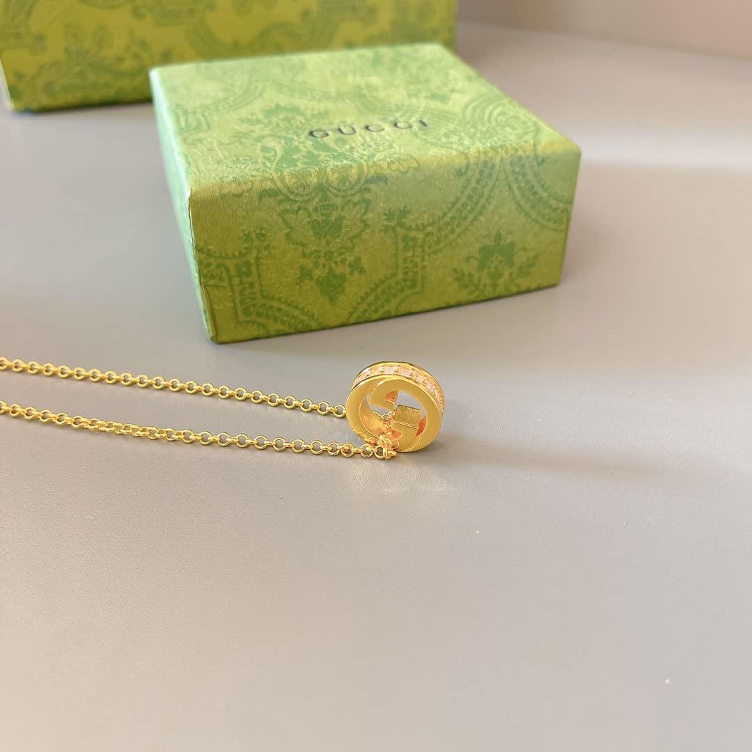 Gucci Gold Tone G Logo and Pearl Pendant Necklace