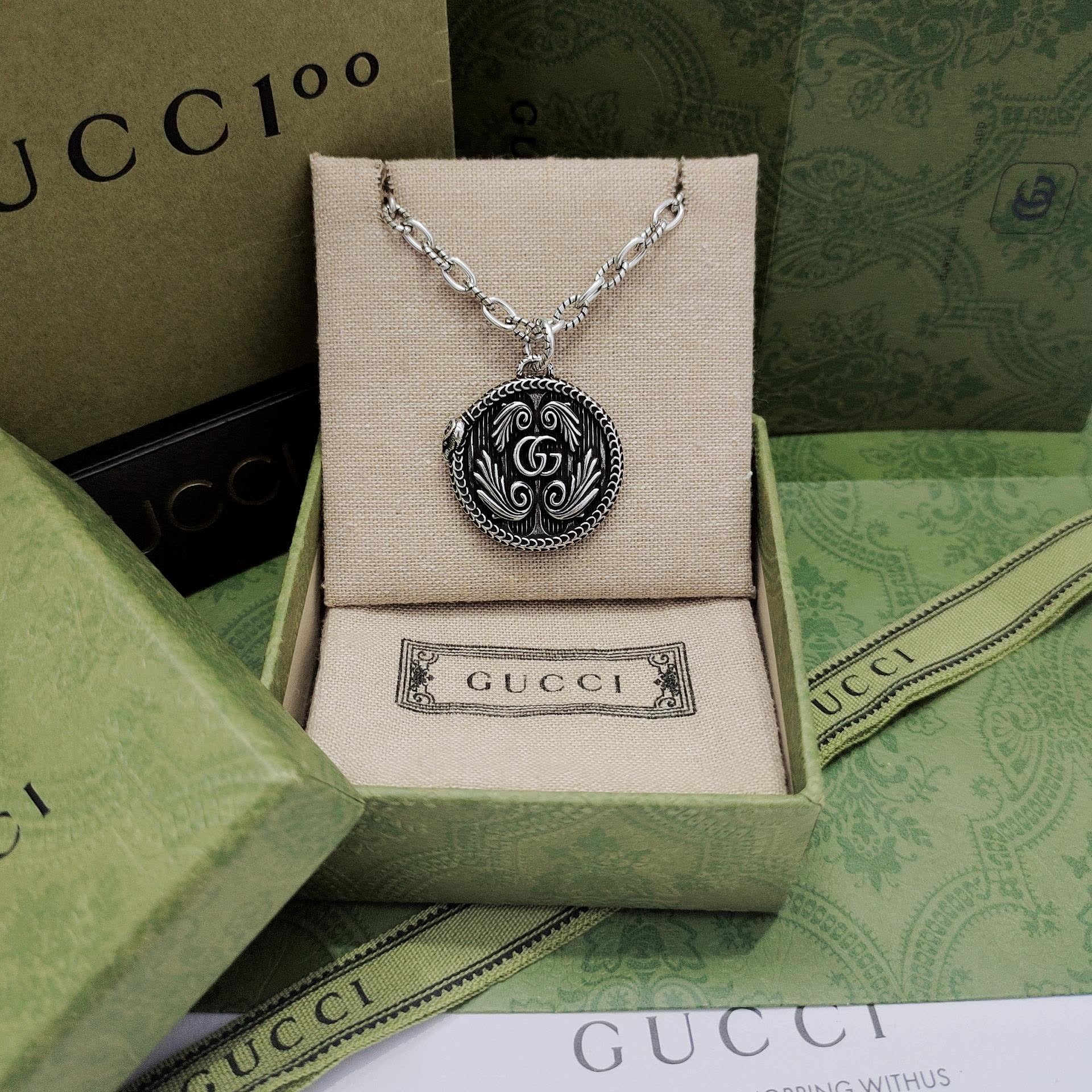 Gucci Silver 'G' Medallion Necklace