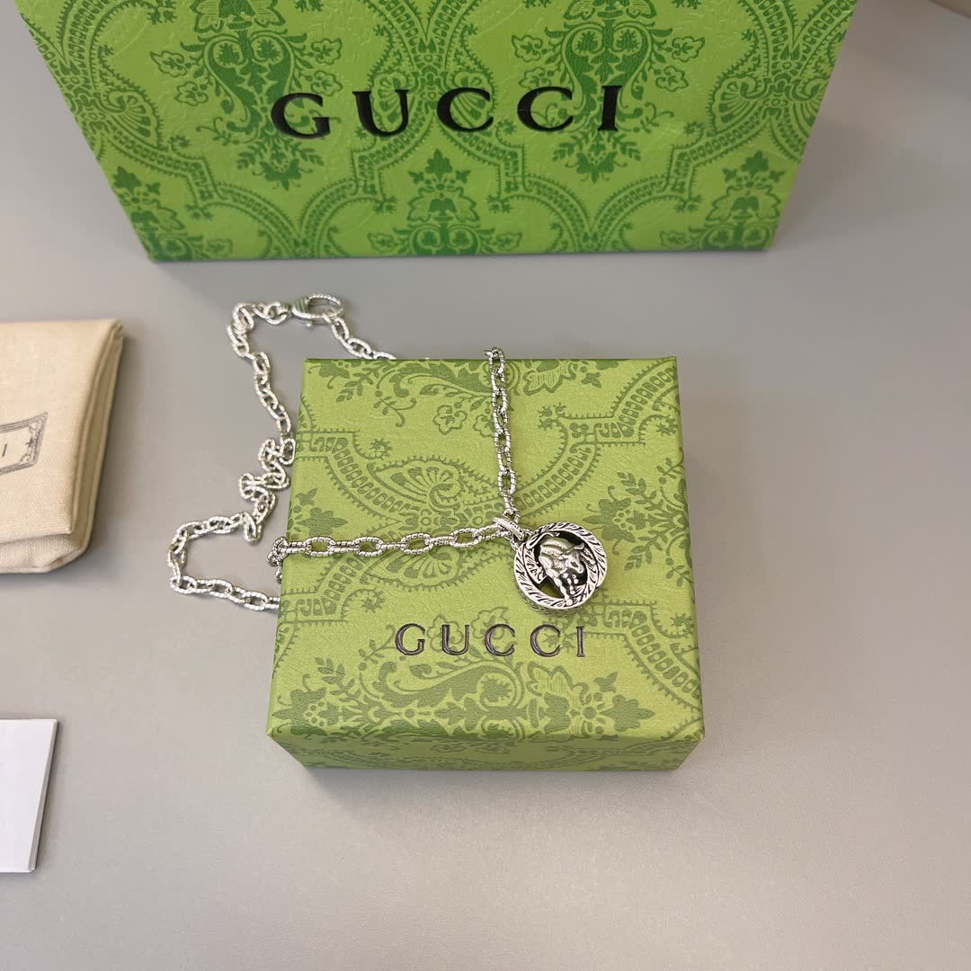 Gucci Silver Chain with Medallion Pendant
