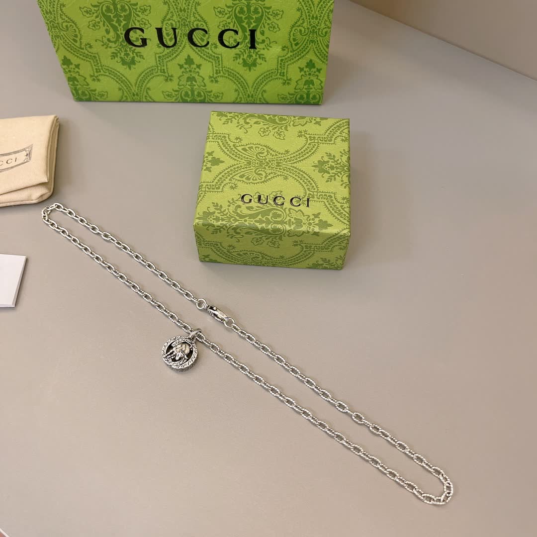 Gucci Silver Chain with Medallion Pendant