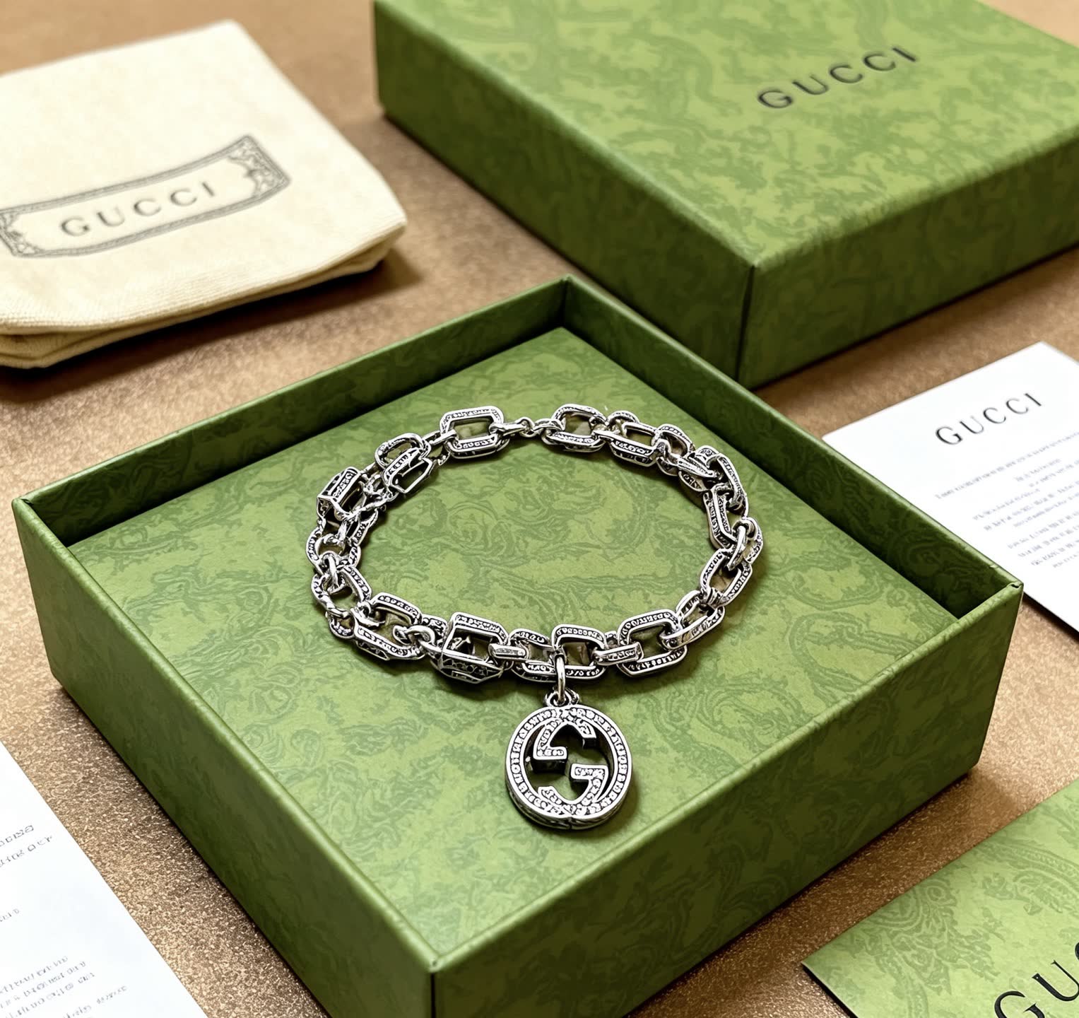 Gucci Silver Chain Bracelet with Interlocking G Pendant