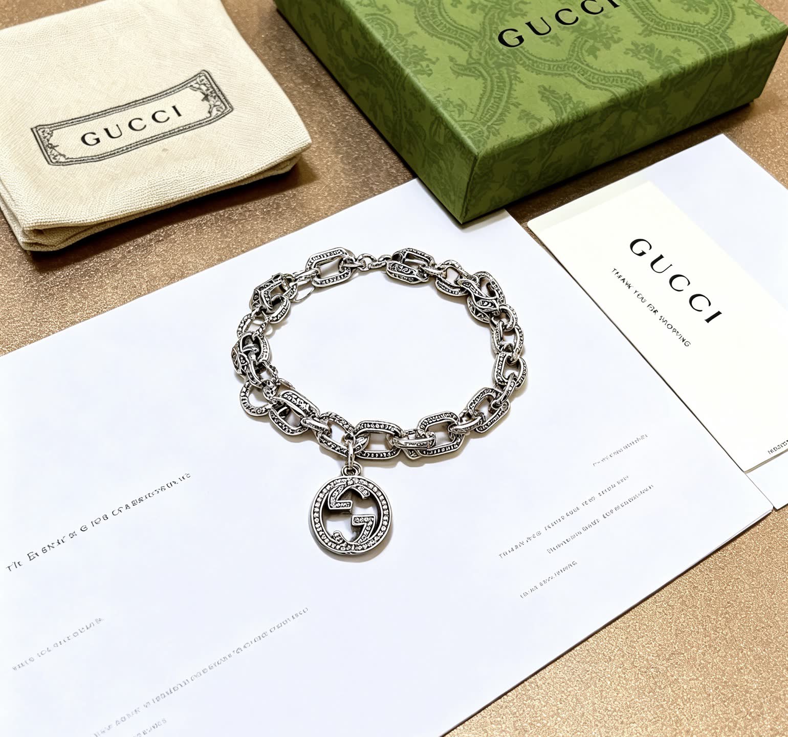 Gucci Silver Chain Bracelet with Interlocking G Pendant