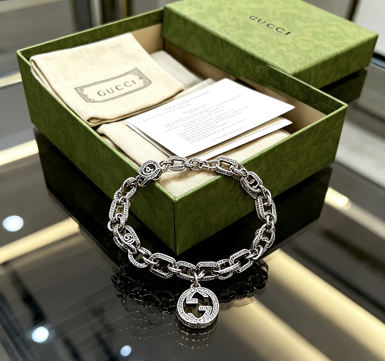 Gucci Silver Chain Bracelet with Interlocking G Pendant