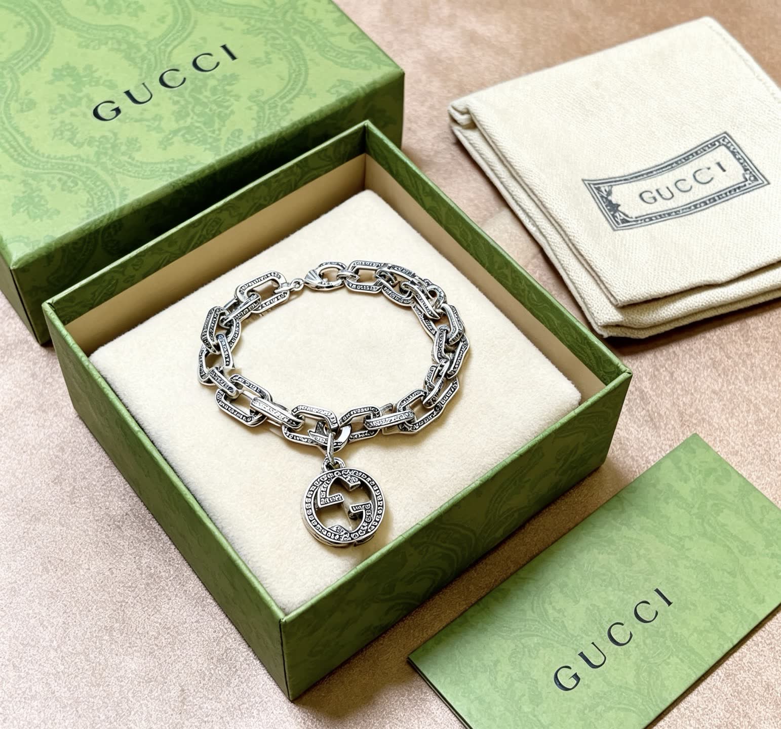 Gucci Silver Chain Bracelet with Interlocking G Pendant