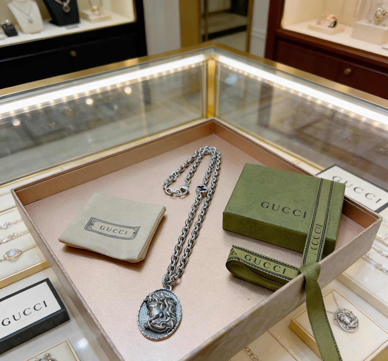 Gucci Silver Medallion Necklace