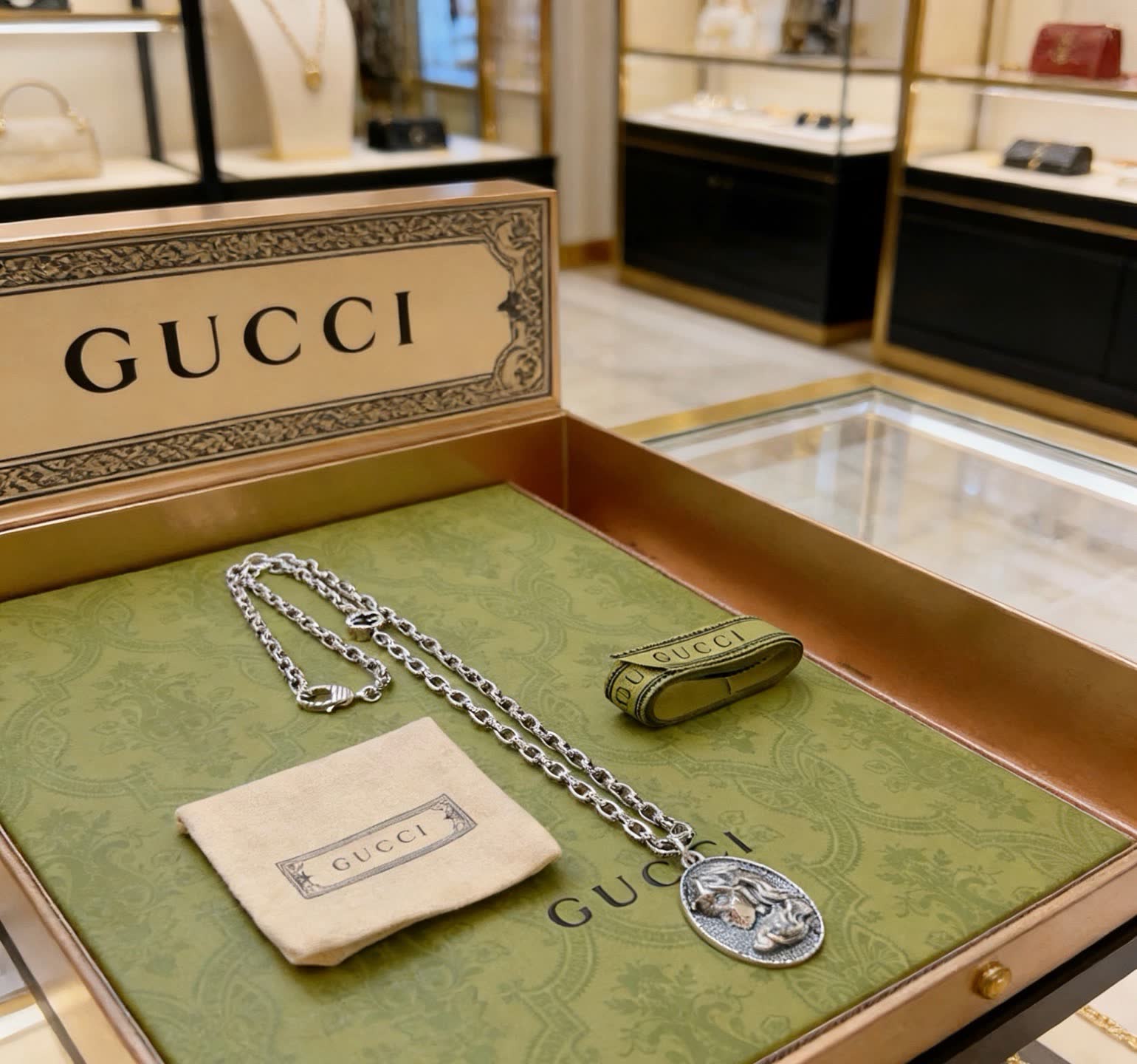 Gucci Silver Medallion Necklace