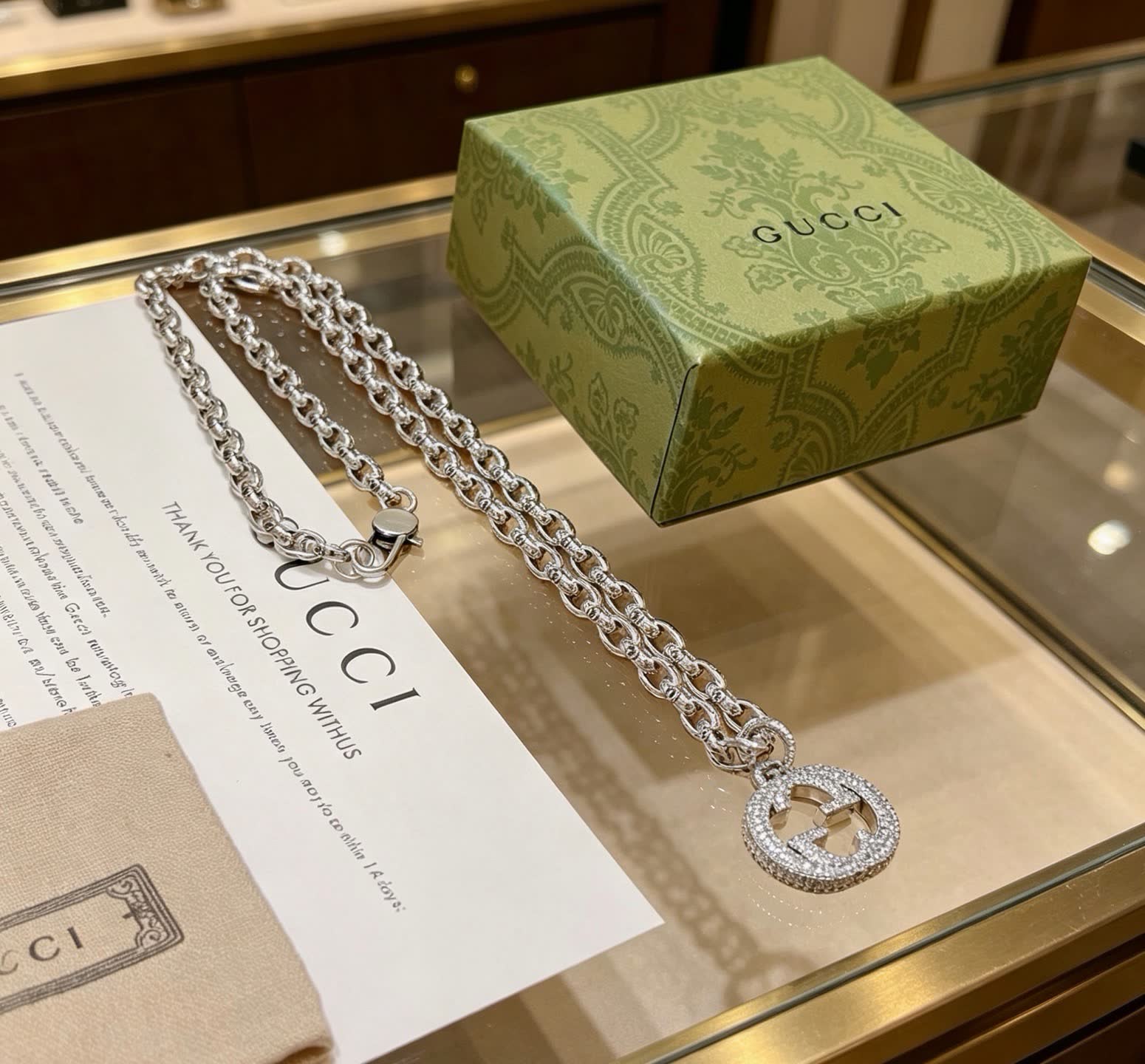 Gucci Silver Chain with Crystal-Embellished Logo Pendant