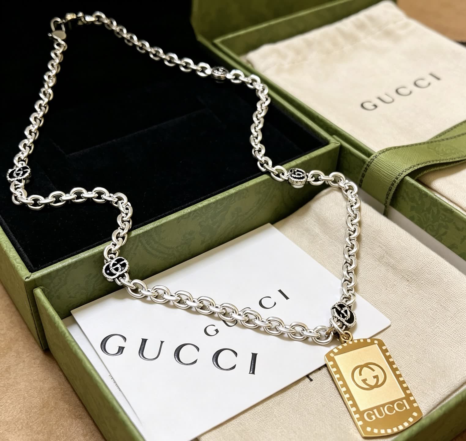 Gucci Silver Chain Necklace with Gold Tag