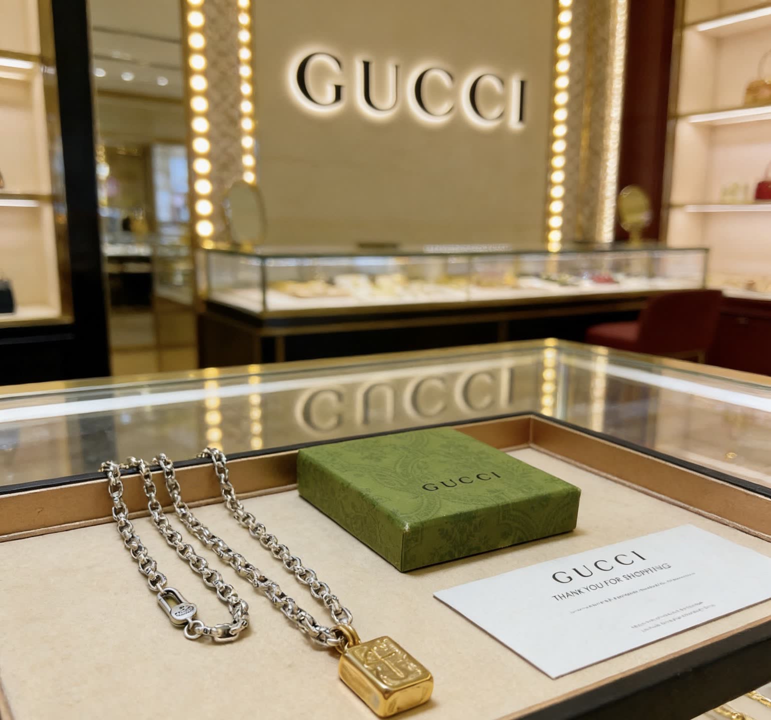 Gucci Silver Chain with Gold Medallion Necklace