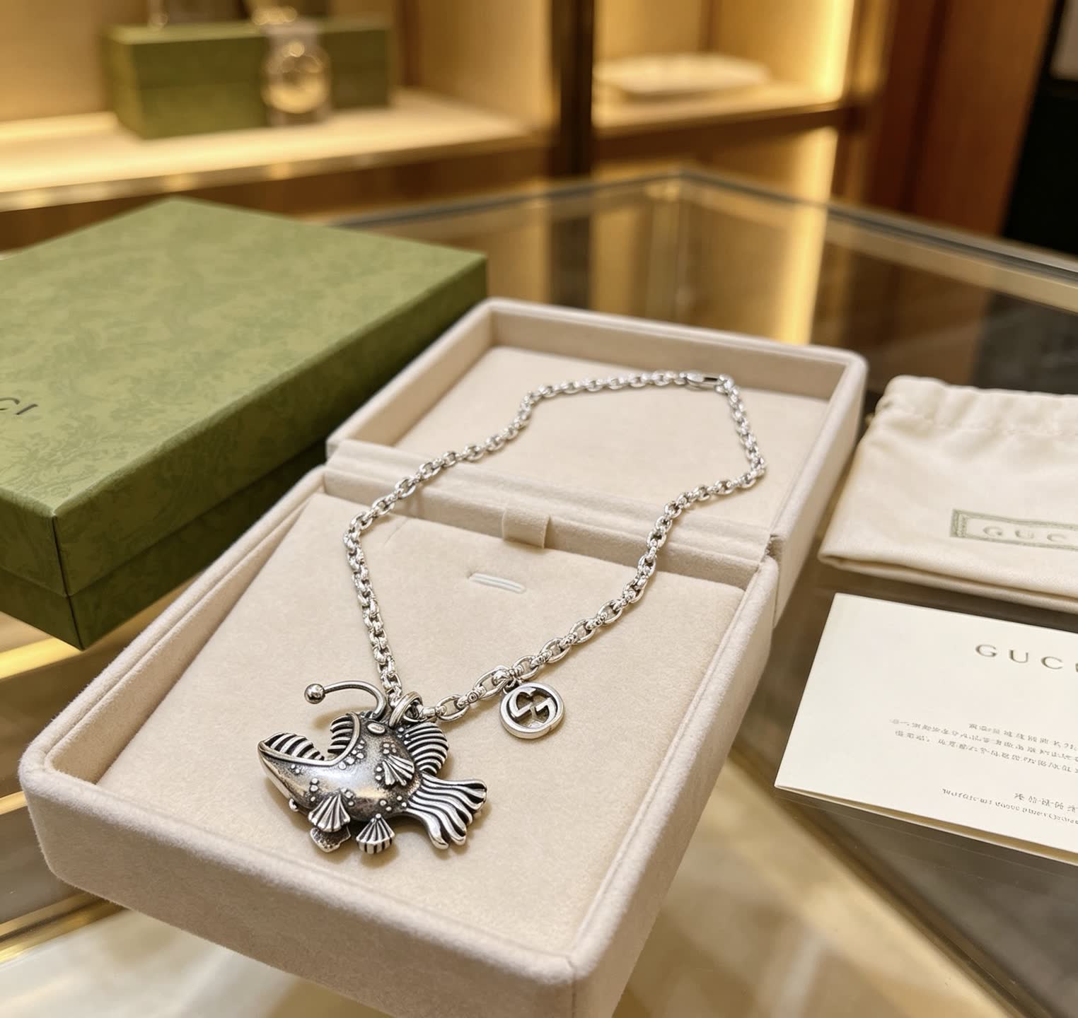 Gucci Silver Fish Pendant Necklace