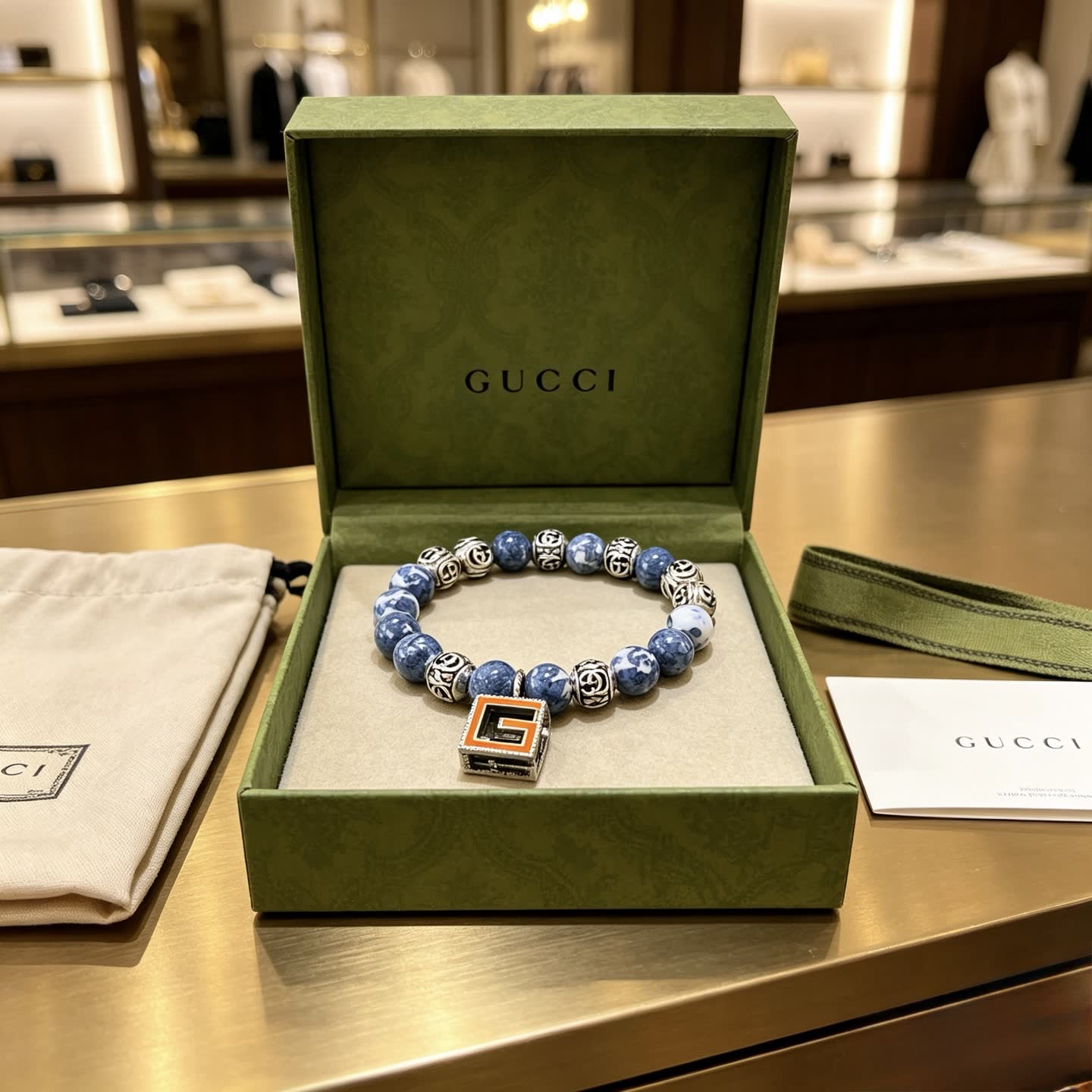 Gucci Blue Beaded Bracelet with G Pendant