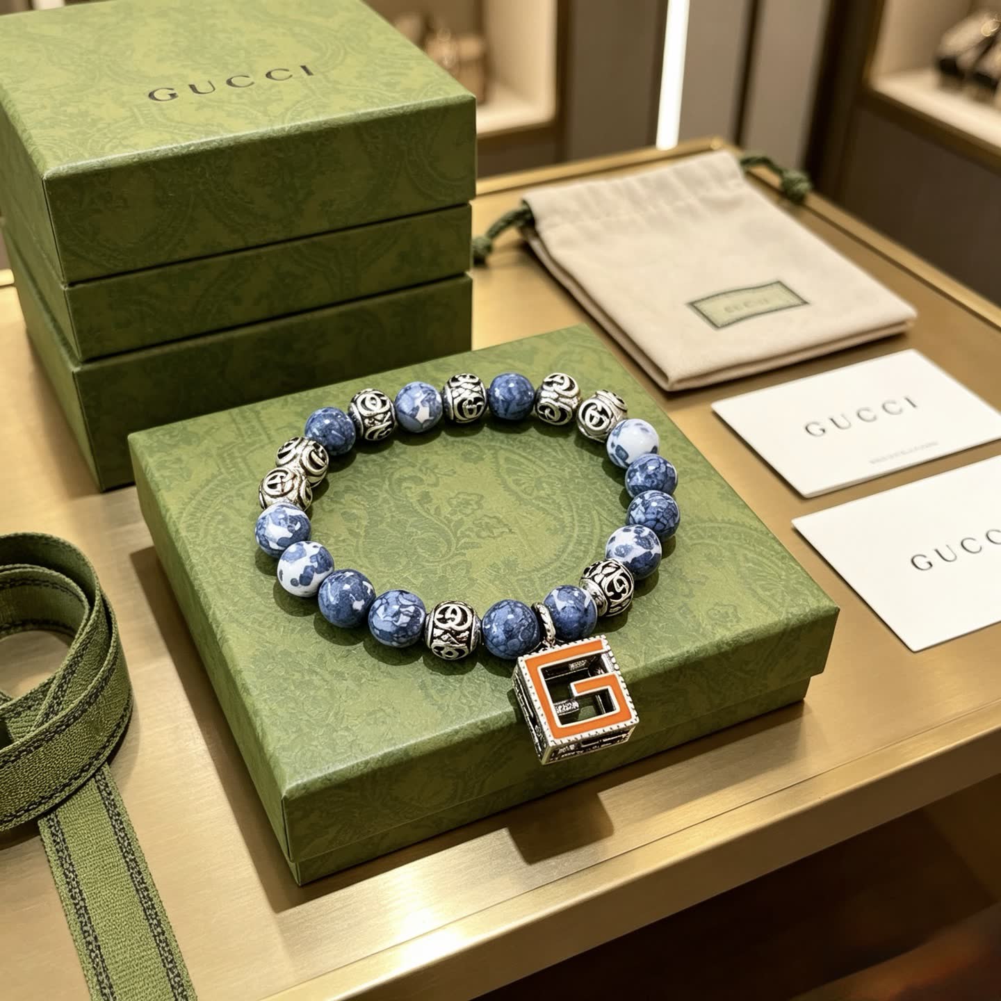 Gucci Blue Beaded Bracelet with G Pendant