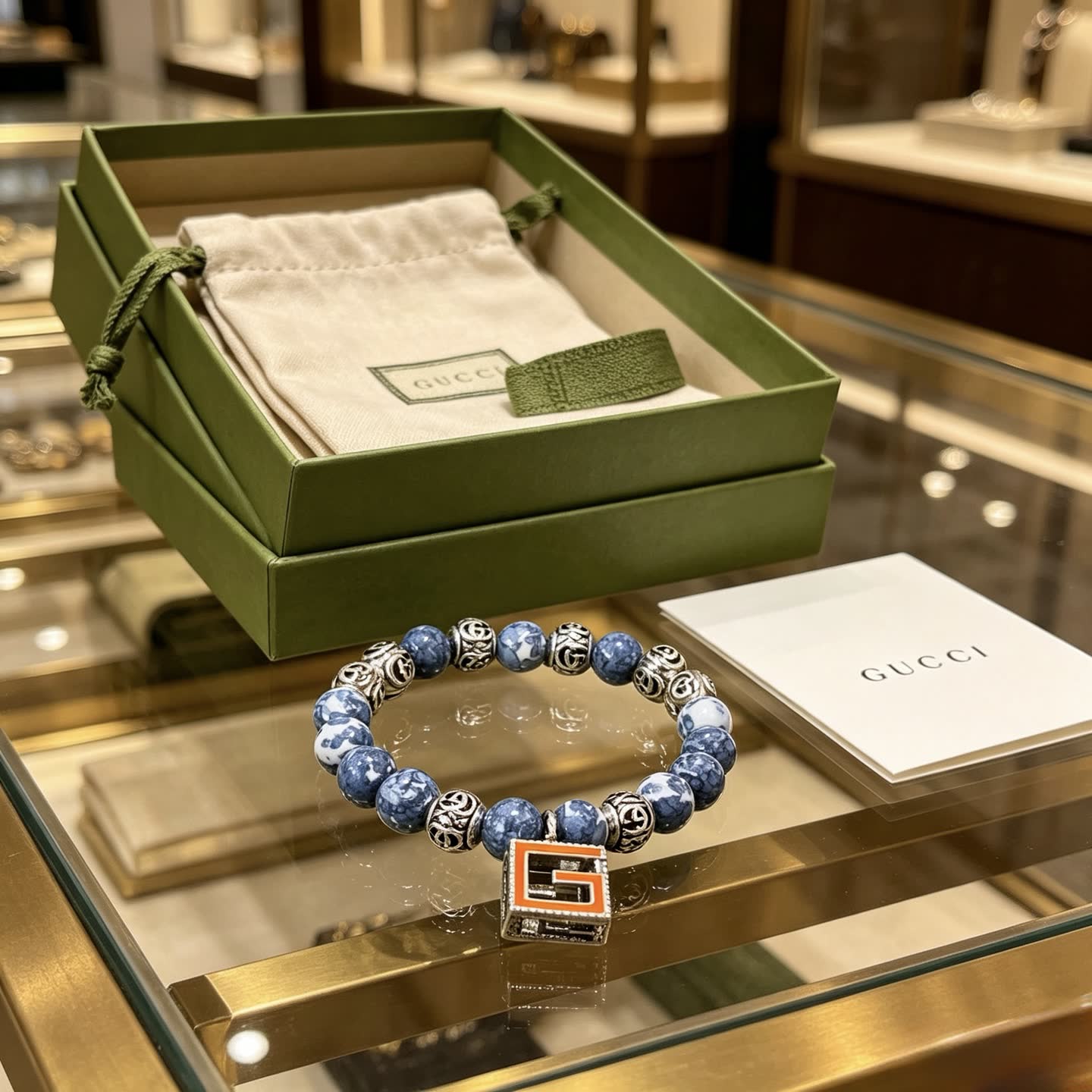 Gucci Blue Beaded Bracelet with G Pendant