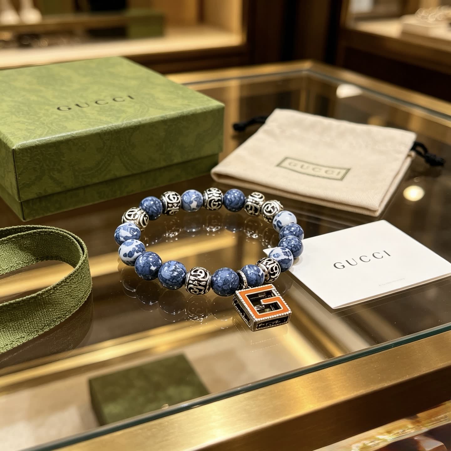 Gucci Blue Beaded Bracelet with G Pendant