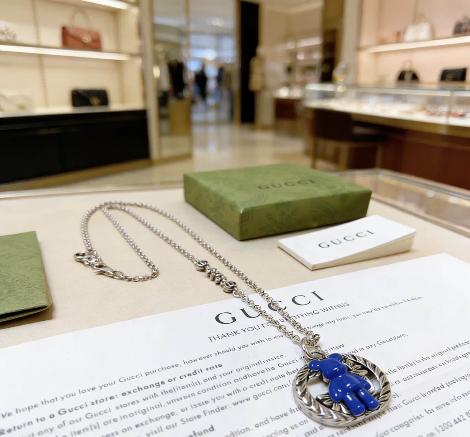 Gucci Silver Chain with Blue Pendant