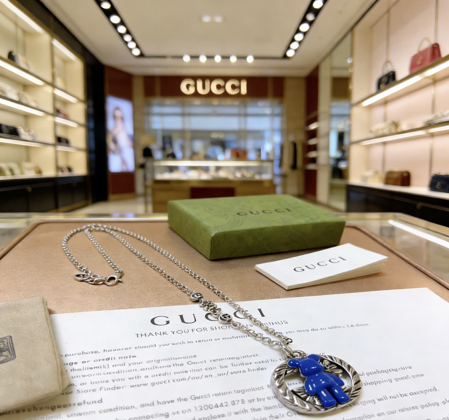 Gucci Silver Chain with Blue Pendant