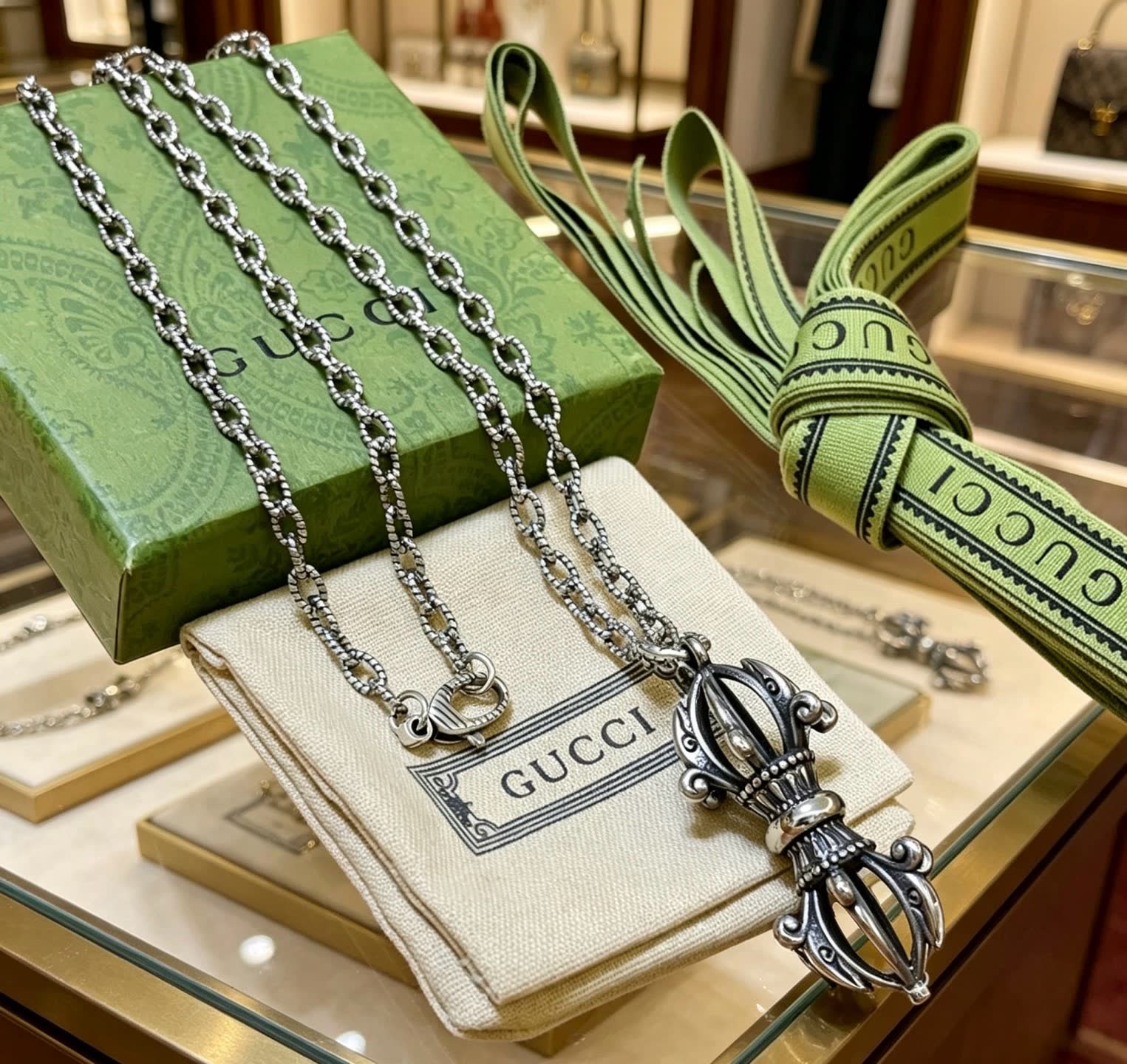 Gucci Silver Chain with Ornate Pendant