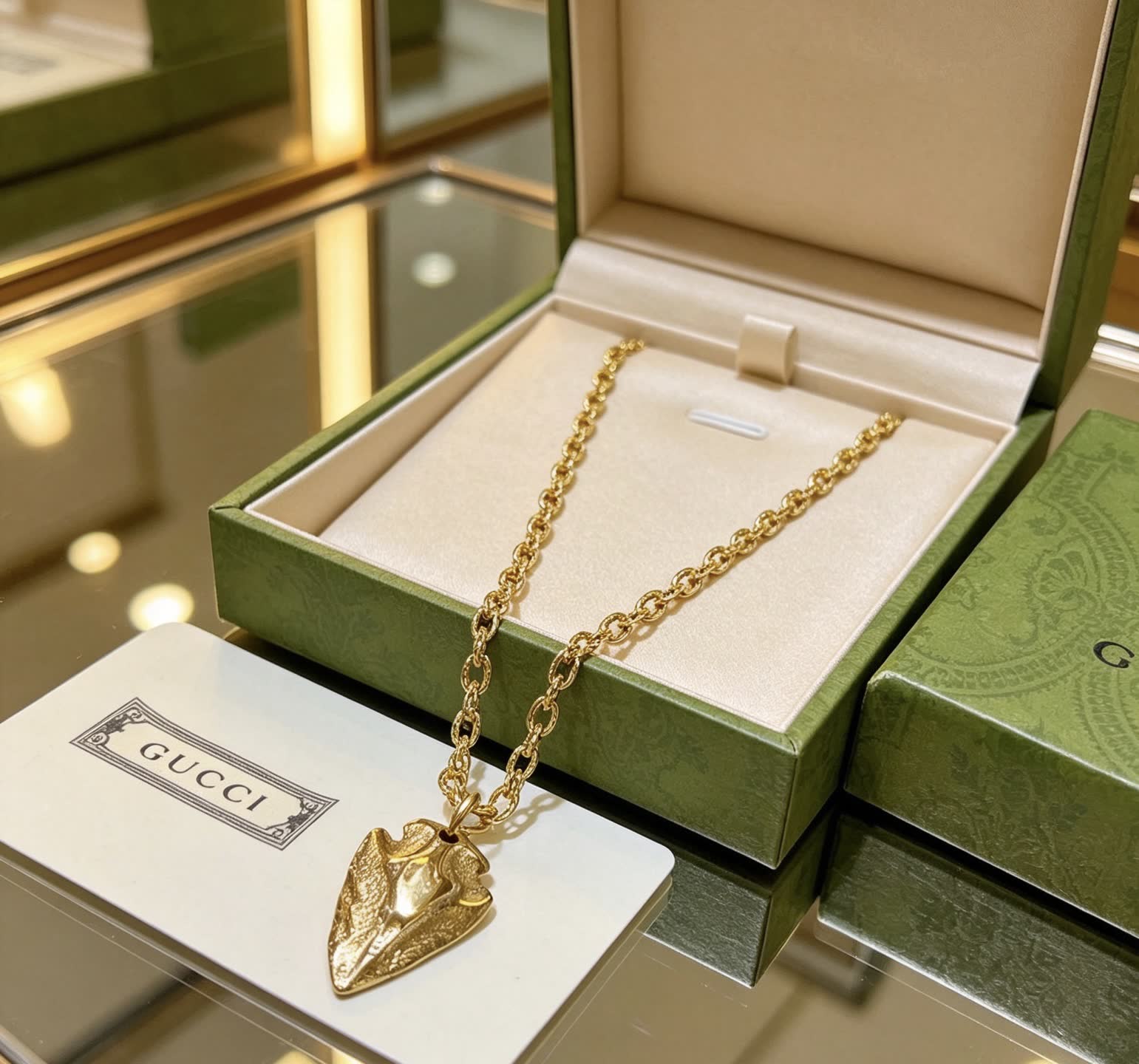 Gucci Gold Leaf Pendant Necklace
