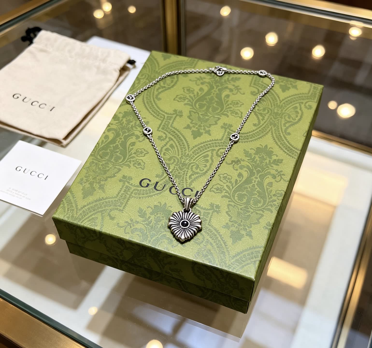 Gucci Silver Chain with Flower Pendant