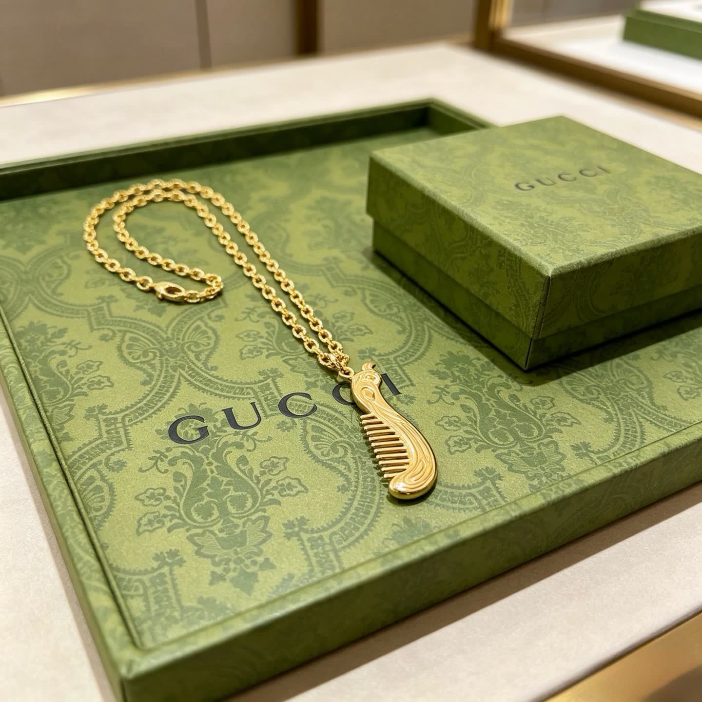Gucci Gold Tone Comb Pendant Necklace Gucci Gold Tone Comb Pendant Necklace