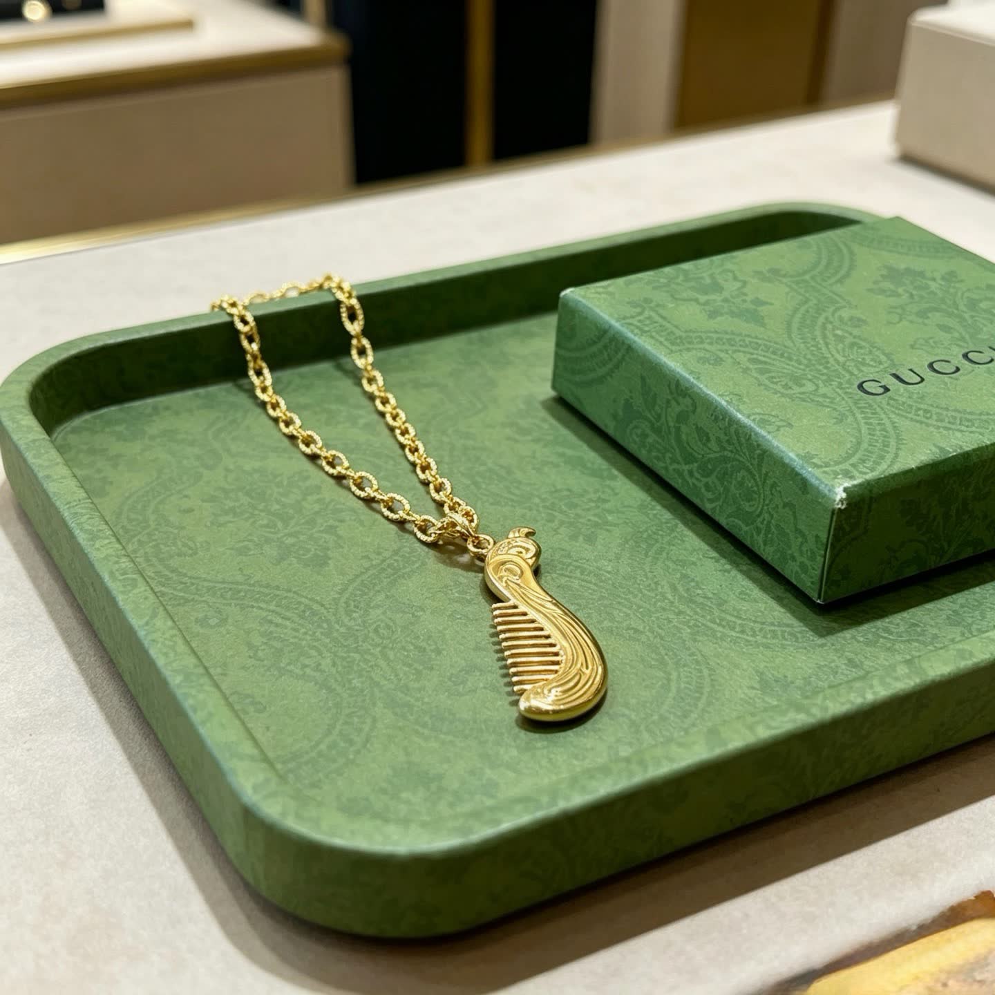 Gucci Gold Tone Comb Pendant Necklace