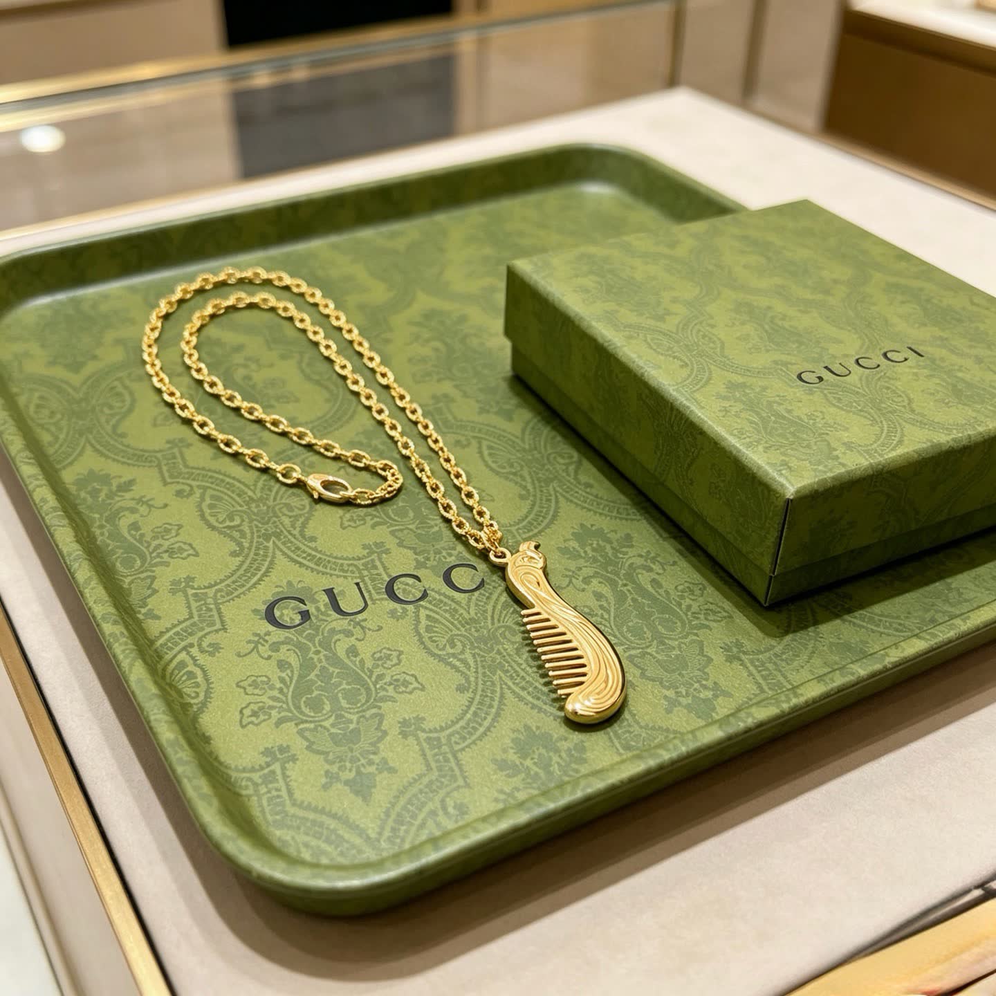 Gucci Gold Tone Comb Pendant Necklace
