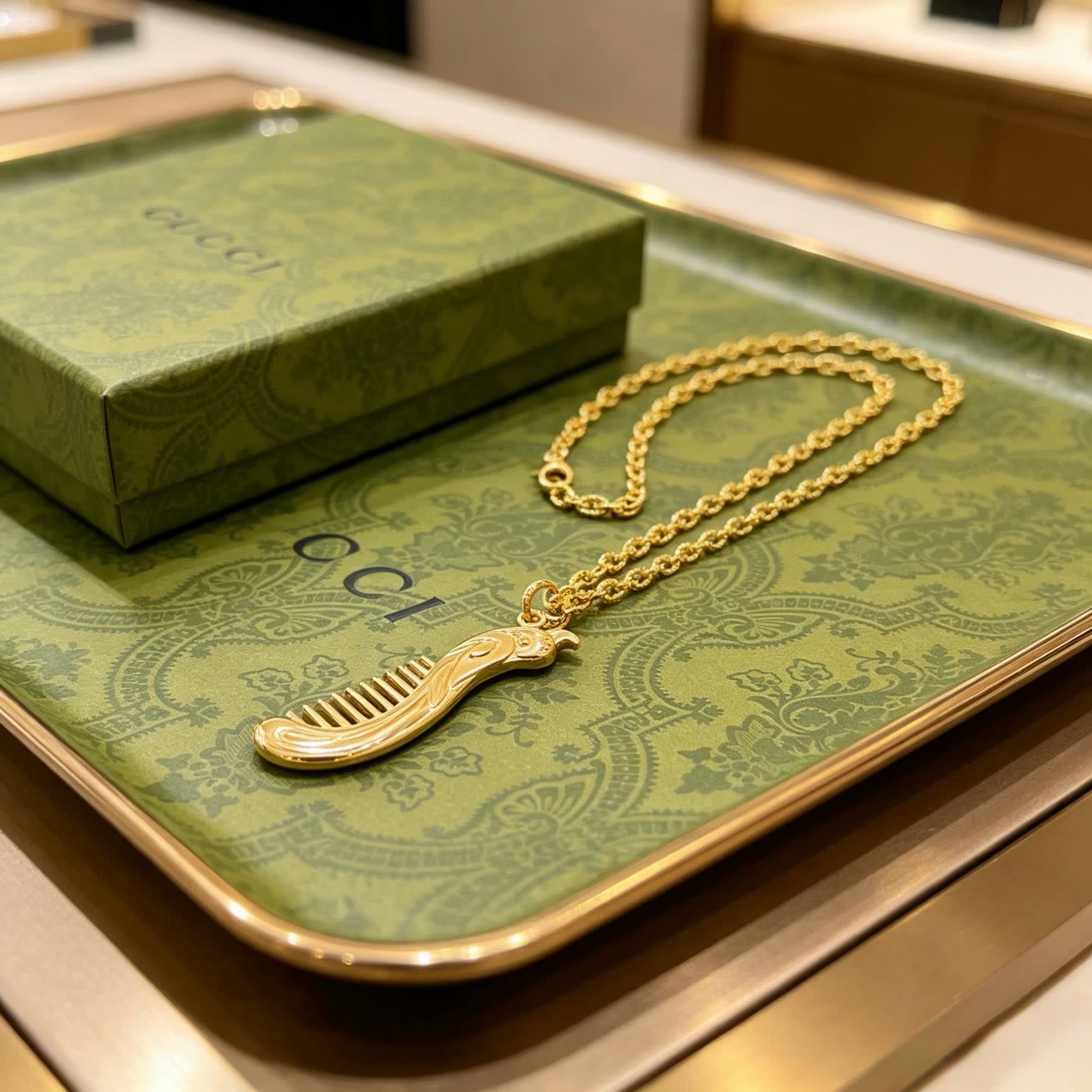 Gucci Gold Tone Comb Pendant Necklace